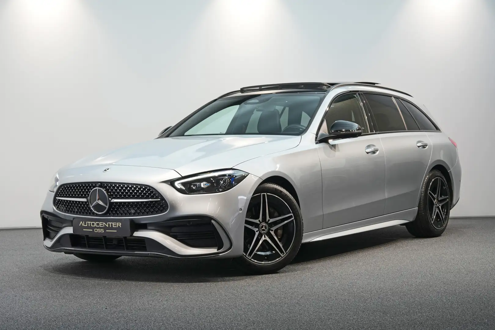 Mercedes-Benz C 200 Estate AMG ✅ PANO ✅ HEAD-UP ✅ 360 CAMERA ✅ MEMORY Grijs - 1