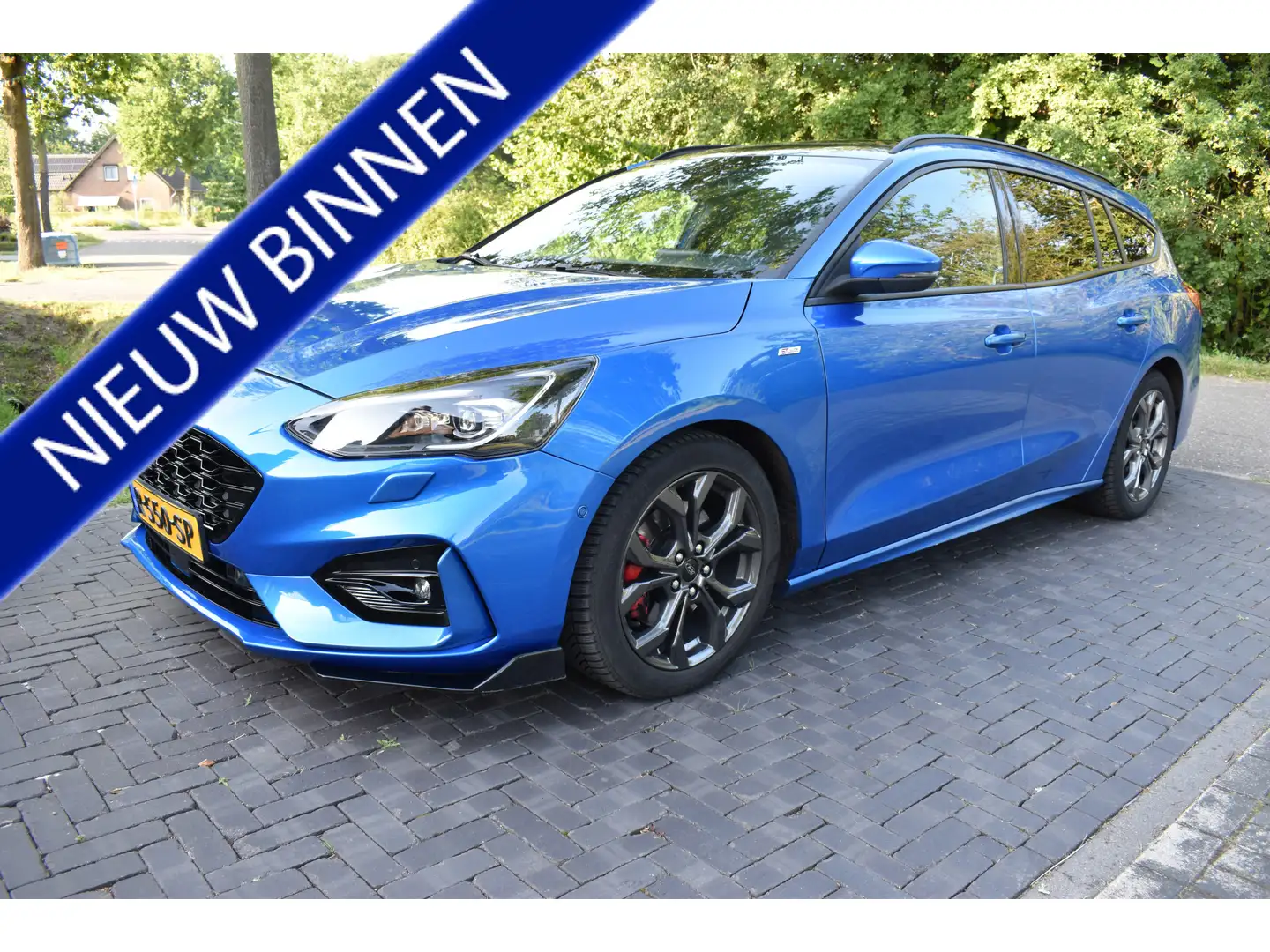 Ford Focus Wagon 1.5 EcoBoost ST Line AUT. 150PK FULL, PANO, Blauw - 1
