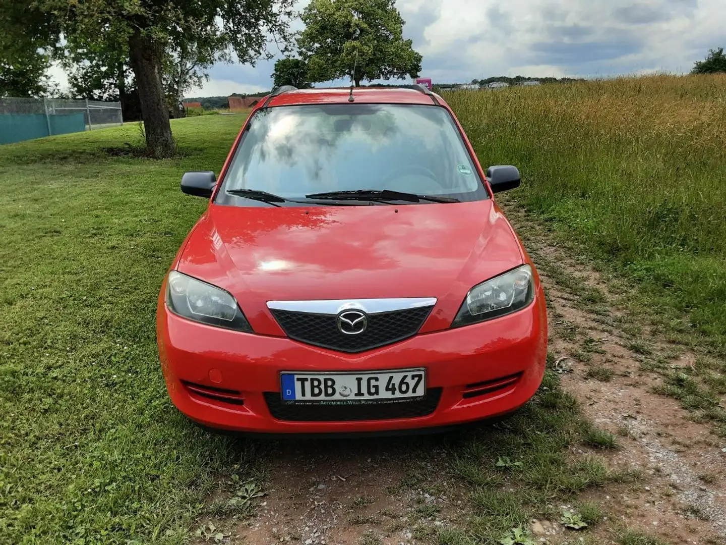 Mazda 2 1.25l Comfort, TÜV Neu, 8-fache Bereifung Rot - 1