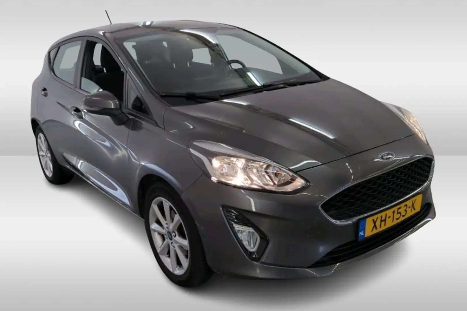 Ford Fiesta 1.1 85PK Trend 5Drs./ Navigatie / Airco / Parkeerh Grijs - 2