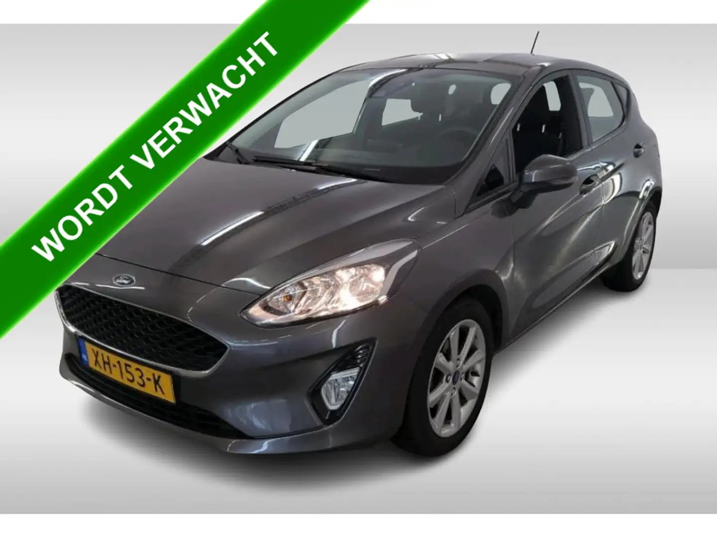 Ford Fiesta 1.1 85PK Trend 5Drs./ Navigatie / Airco / Parkeerh Grijs - 1