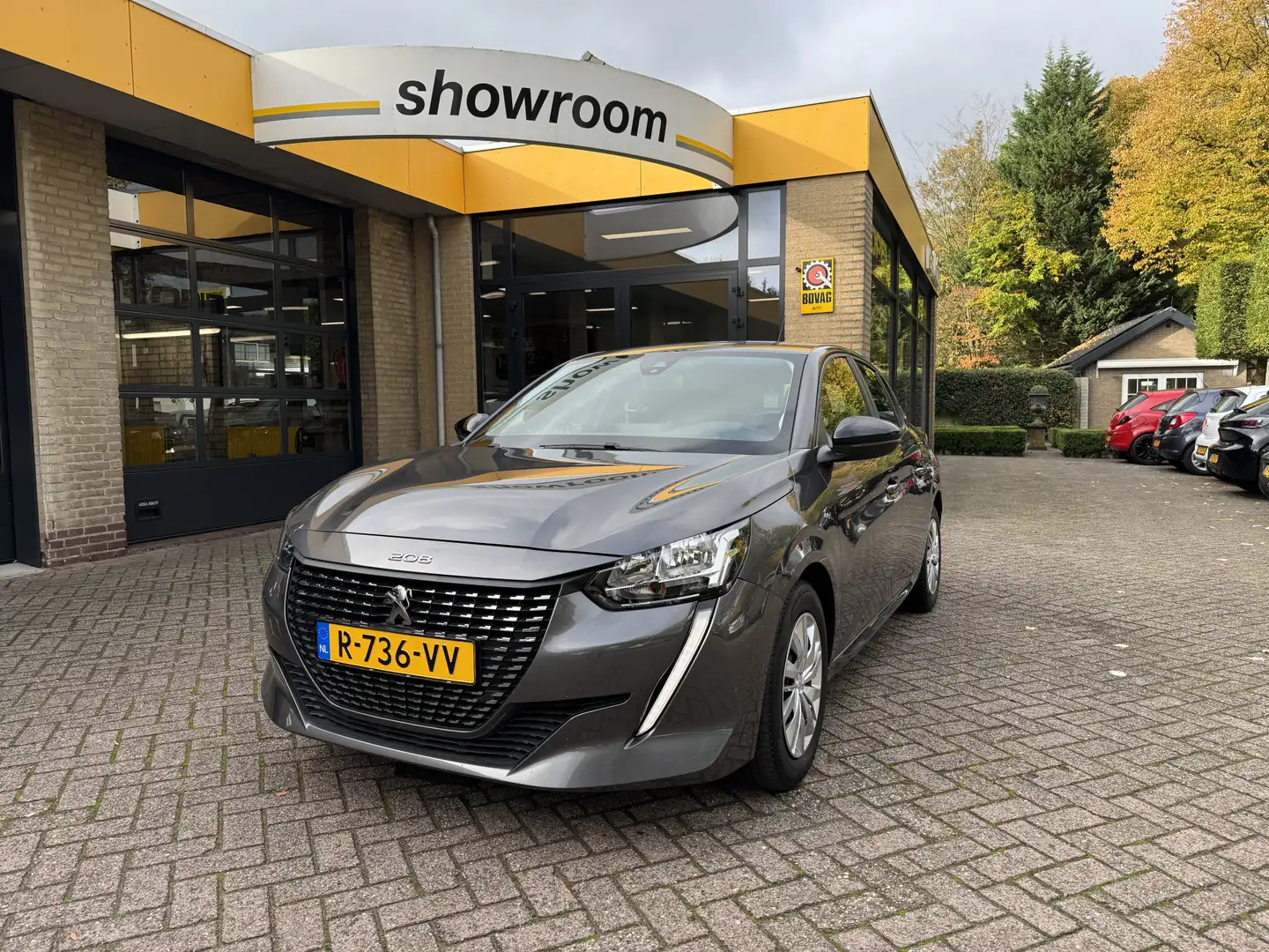 Peugeot 208 1.2 PureTech Active Navi Airco Carplay Grijs - 1