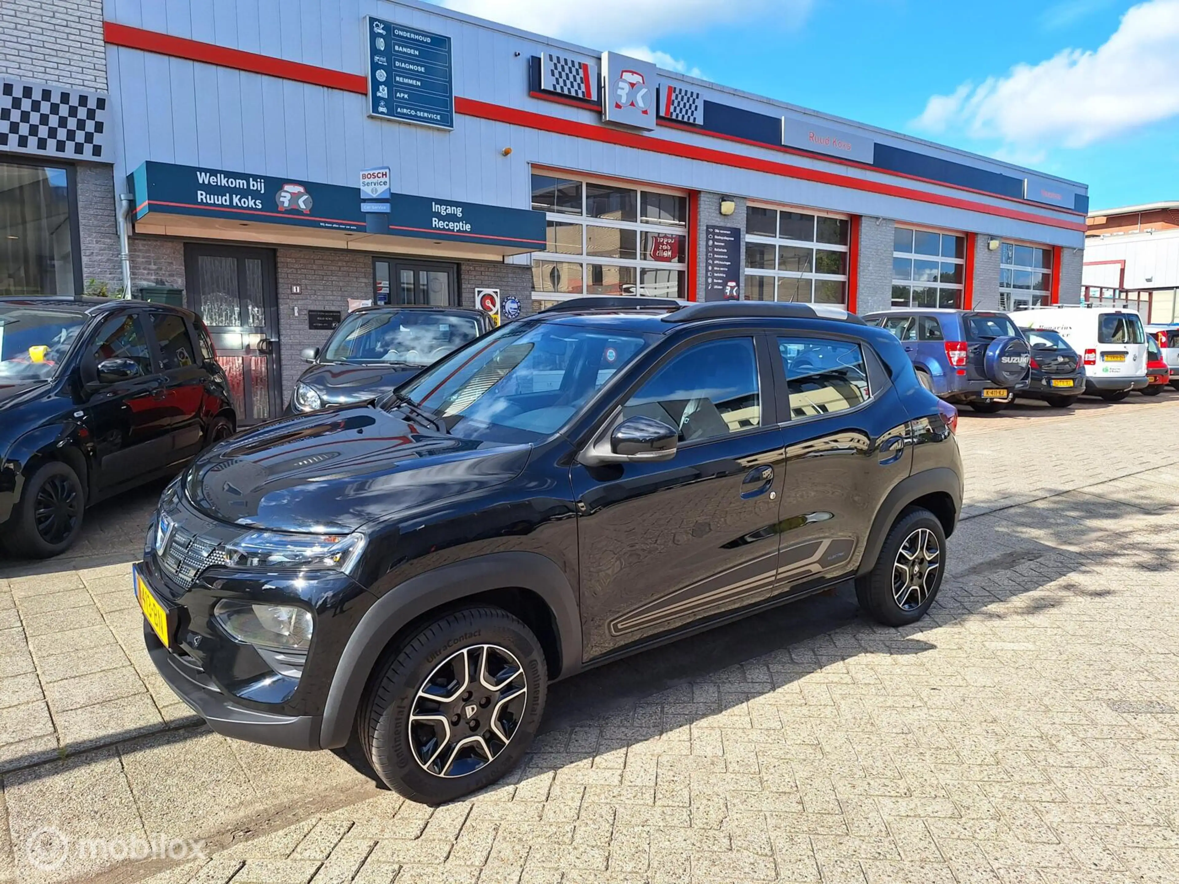 Dacia Spring COMFORT PLUS (ORANGE PACK) 27 kWh • 1E EIGENAAR • — photo 3