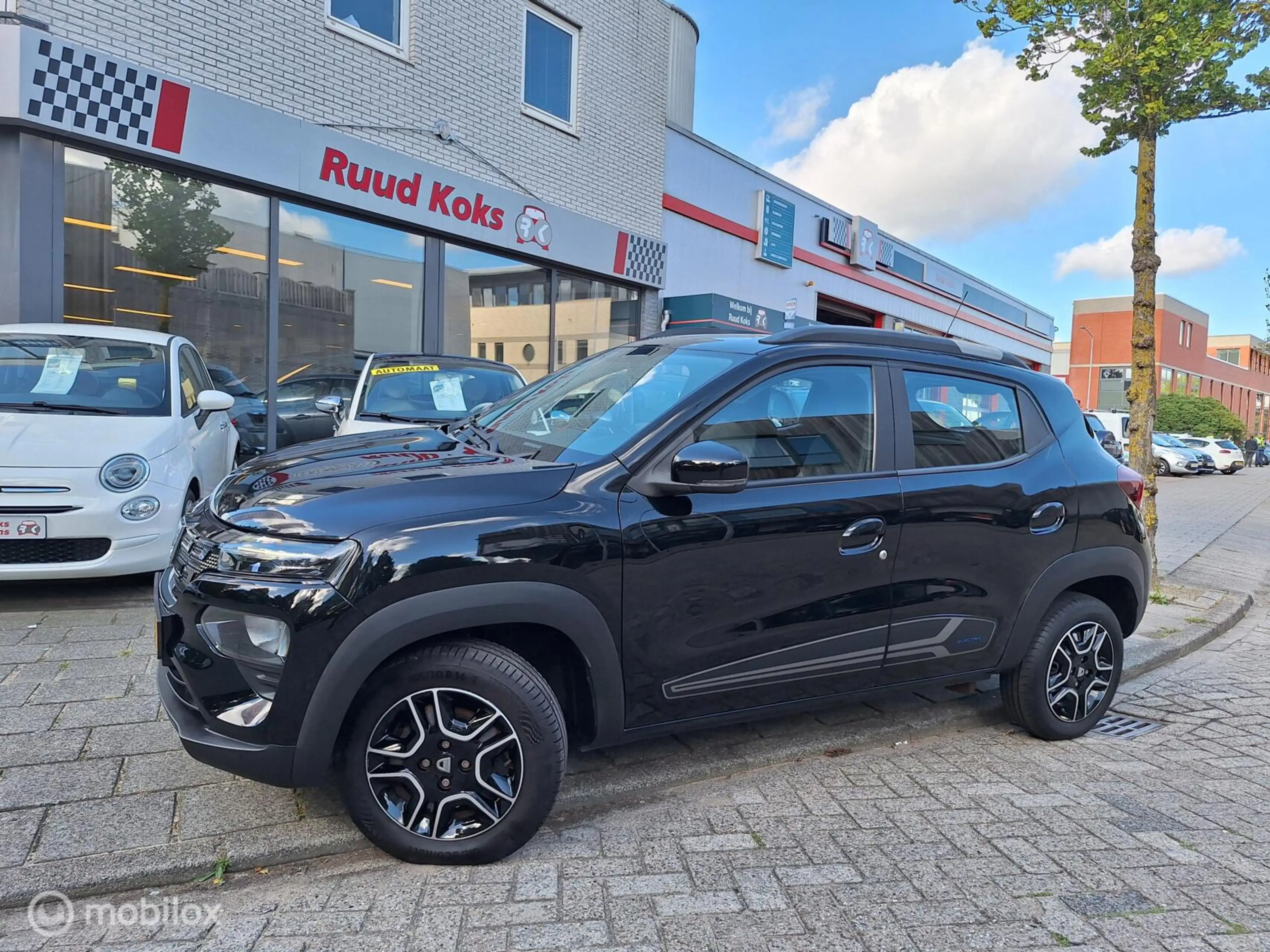 Dacia Spring COMFORT PLUS (ORANGE PACK) 27 kWh • 1E EIGENAAR •
