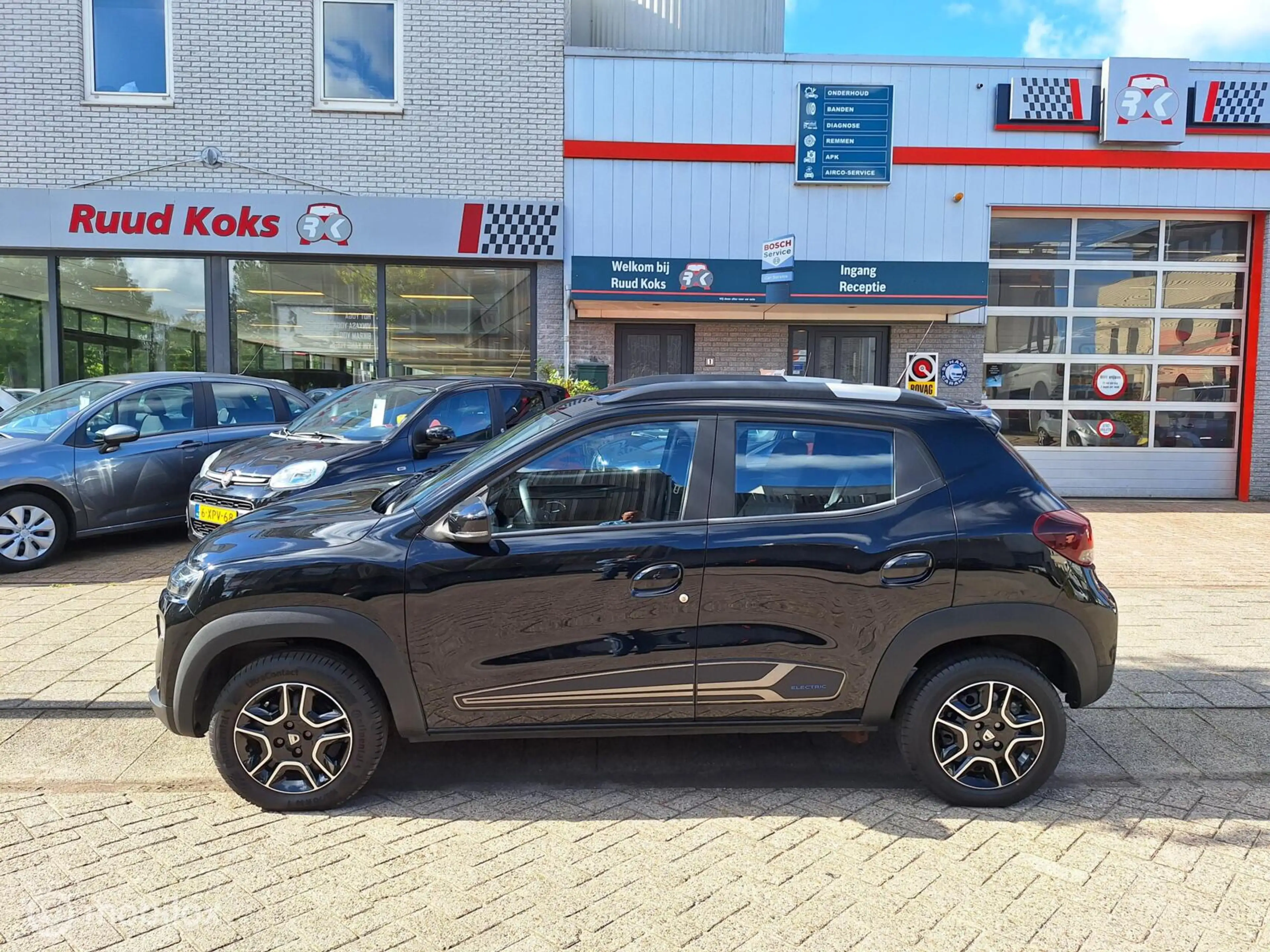Dacia Spring COMFORT PLUS (ORANGE PACK) 27 kWh • 1E EIGENAAR • — photo 2