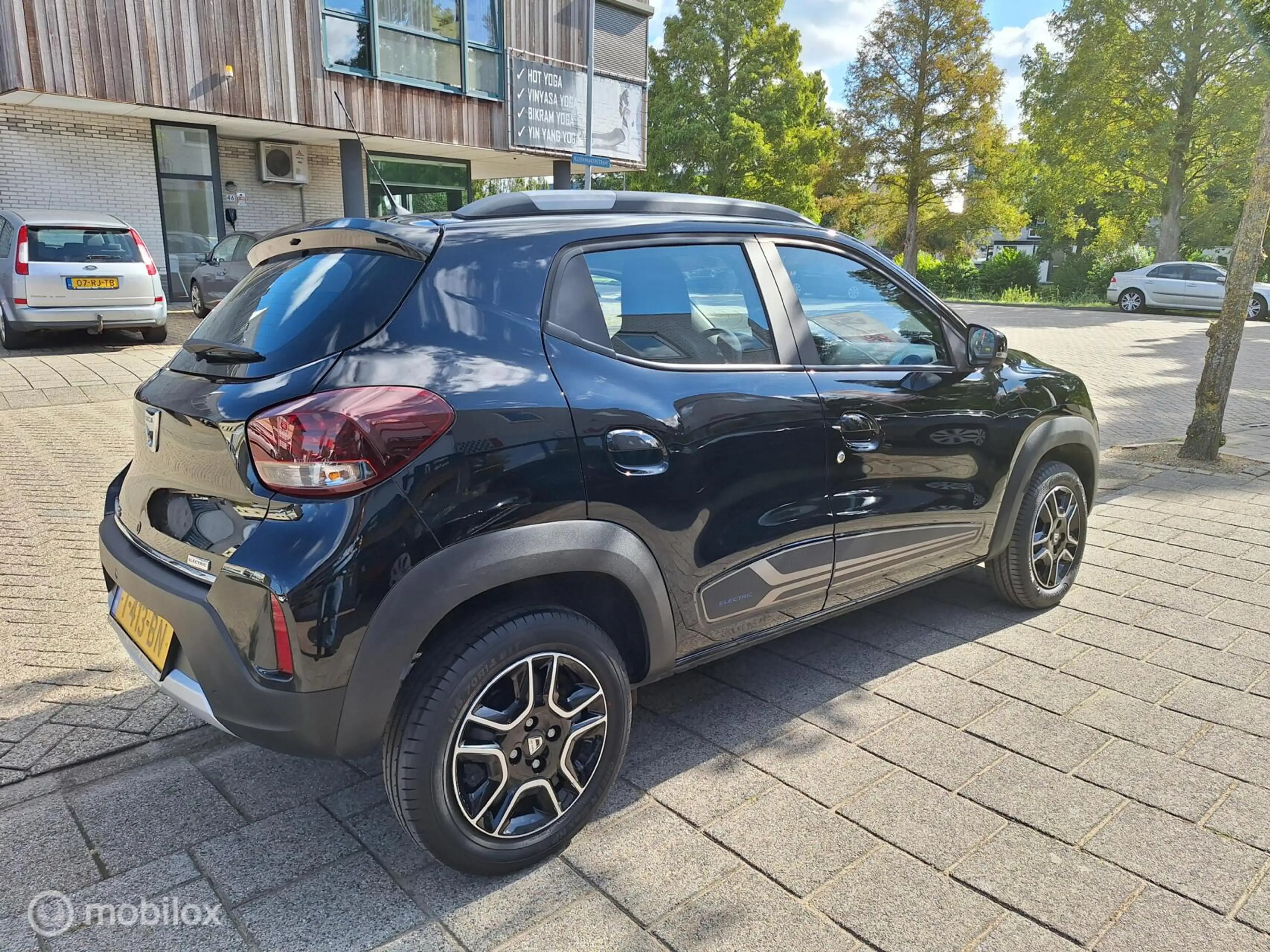 Dacia Spring COMFORT PLUS (ORANGE PACK) 27 kWh • 1E EIGENAAR • — photo 7