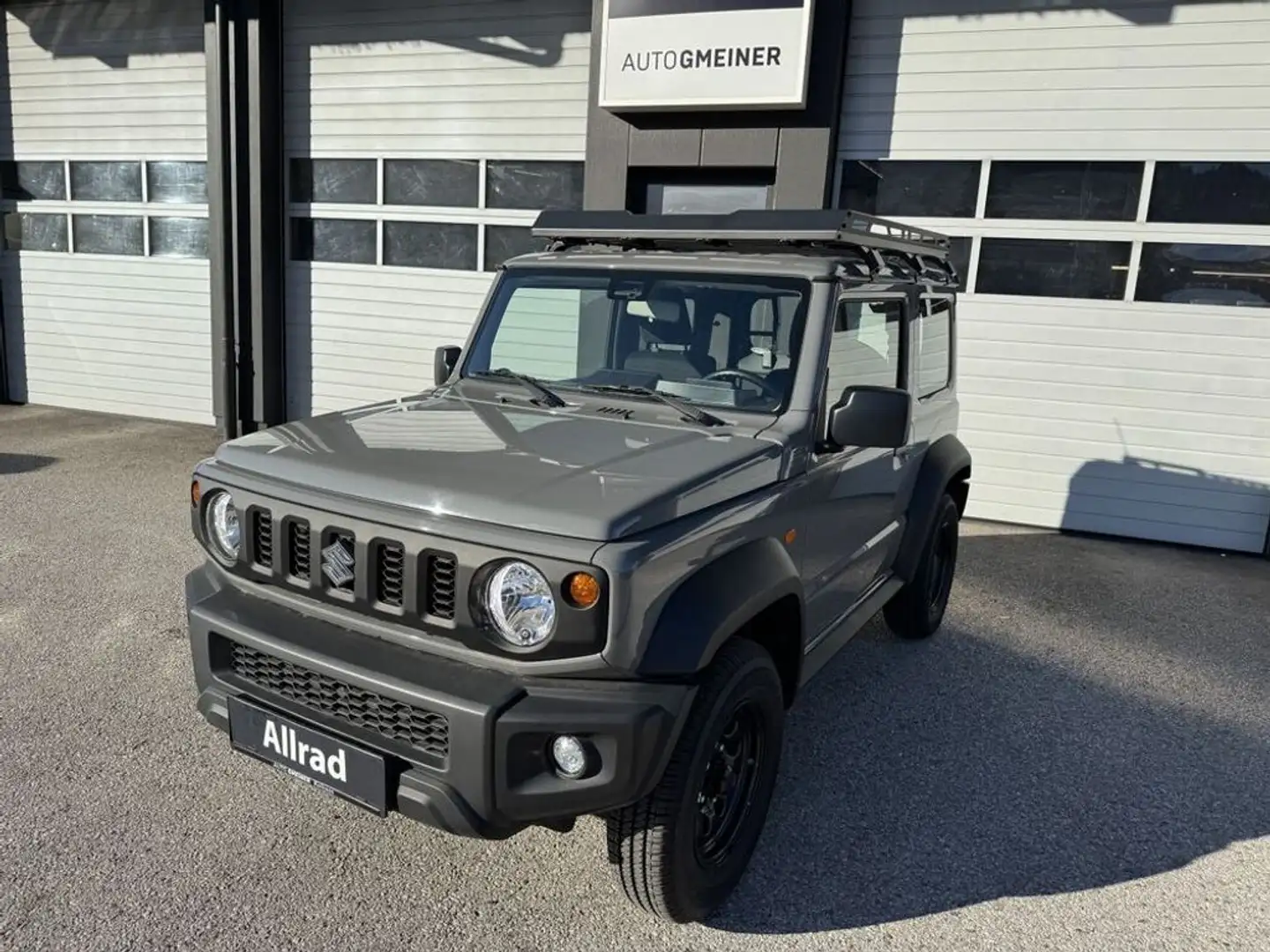 Suzuki Jimny Austria Allgrip  *Dachträger*Heckleiter*AHK* Grau - 1