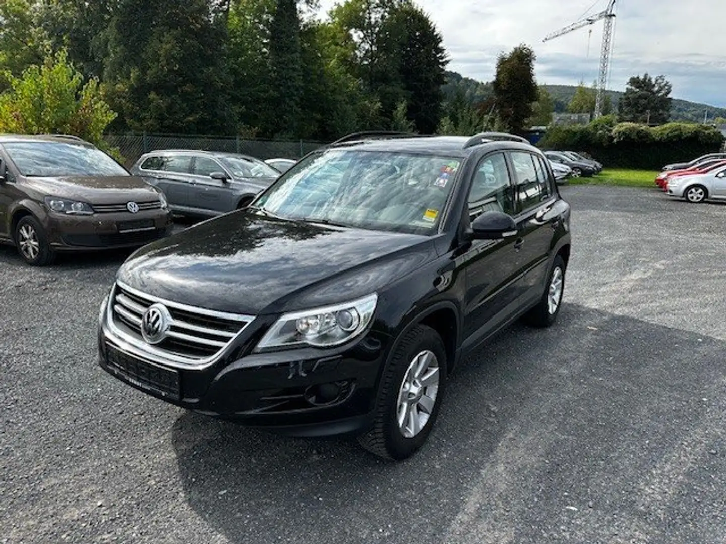 Volkswagen Tiguan Track /2.Hand/Klimatr./Leder/Temp./SHZ/PDC/Aluu Schwarz - 1