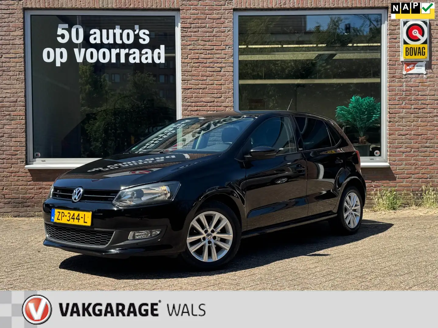 Volkswagen Polo 1.2-12V COMFORTLINE | AIRCO | VELGEN | STOELVERWAR Zwart - 1
