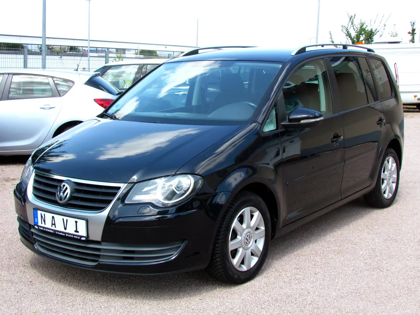 Volkswagen Touran Freestyle 1,4 TSI*EURO 5*NAVI*KLIMA*XENON Schwarz - 1