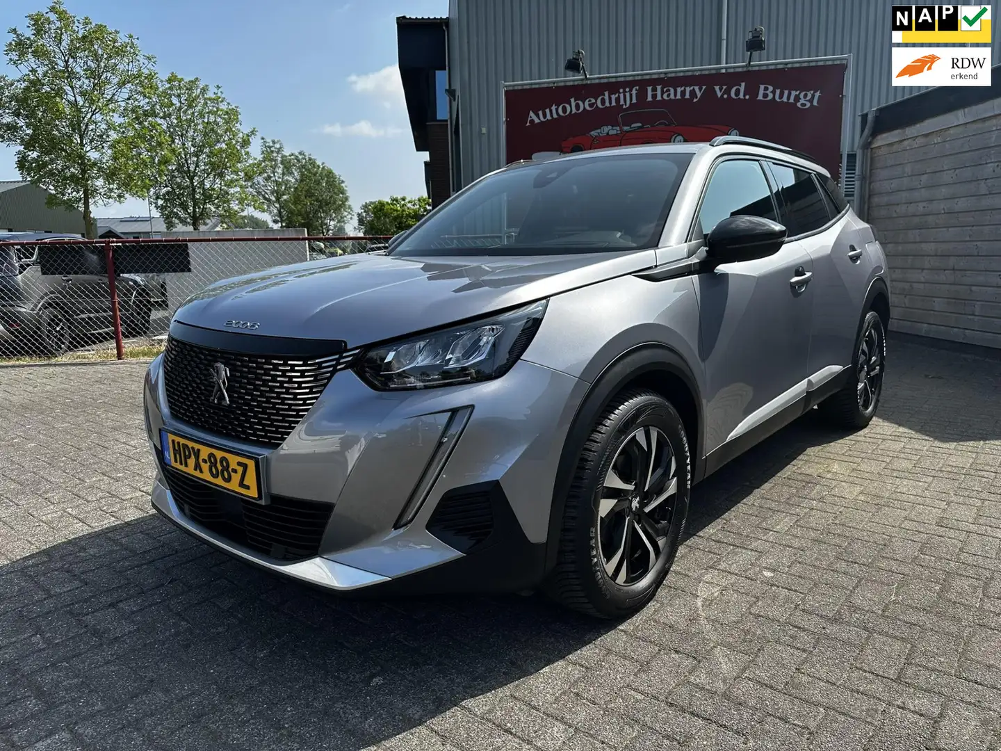 Peugeot 2008 1.2 PureTech Allure Pack Navigatie | Camera | Clim Gris - 1