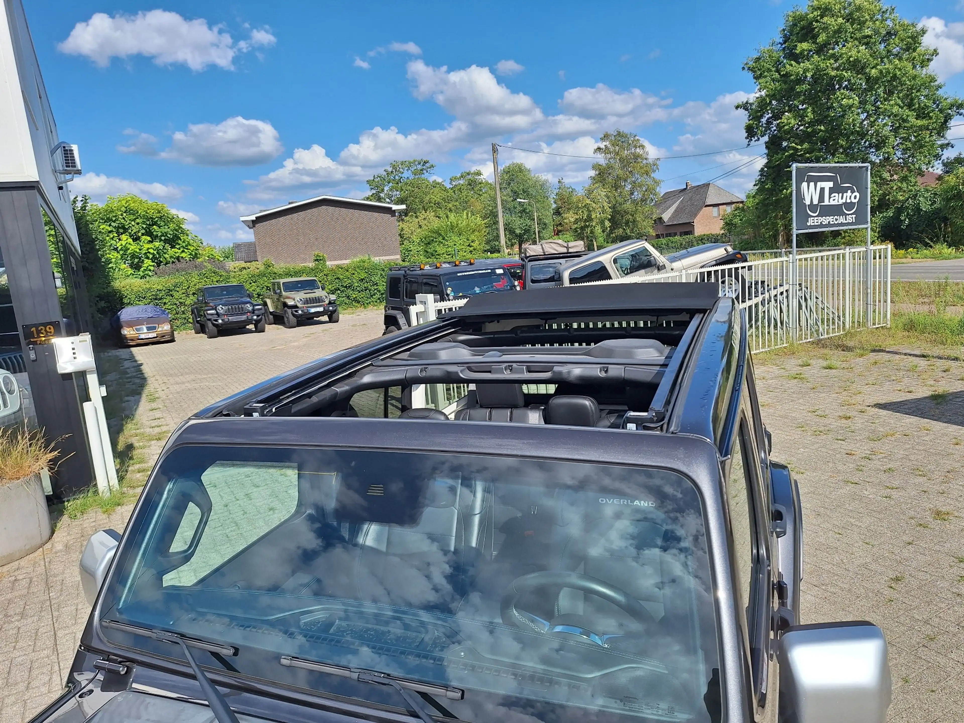 Jeep Wrangler Wrangler 2.0 Turbo Sahara Overland SKY ONE TOUCH — photo 2