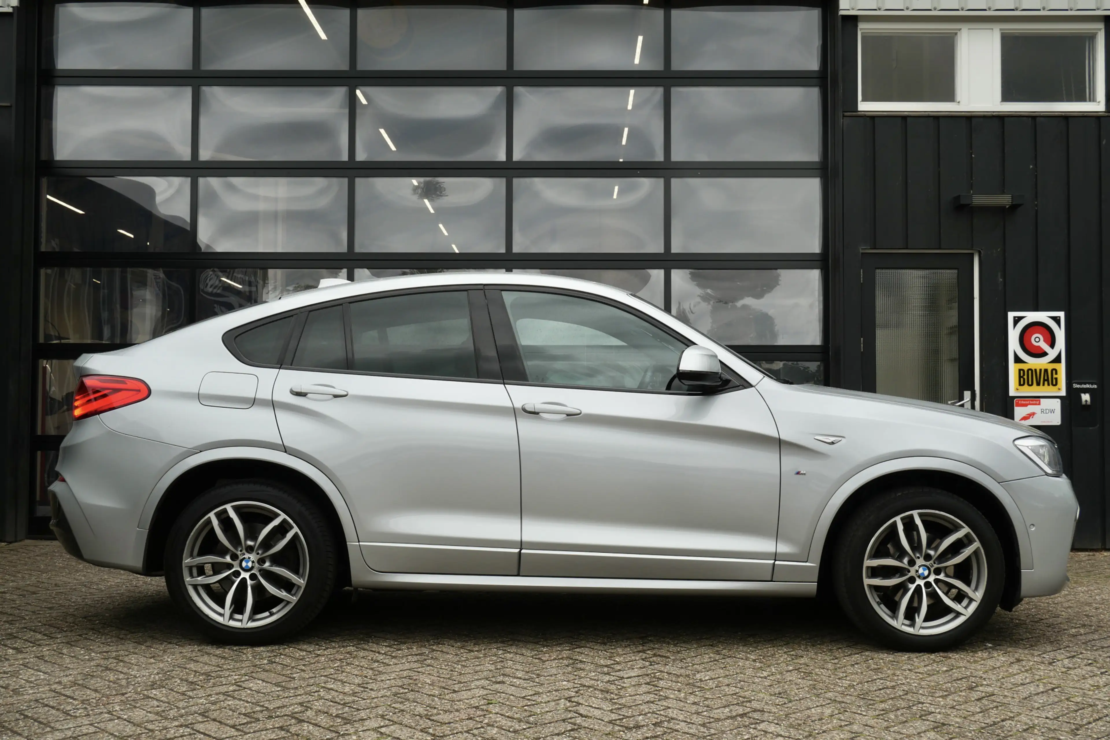 BMW X4 xDrive20i High Executive M Sport Edition | NL-Auto — photo 4