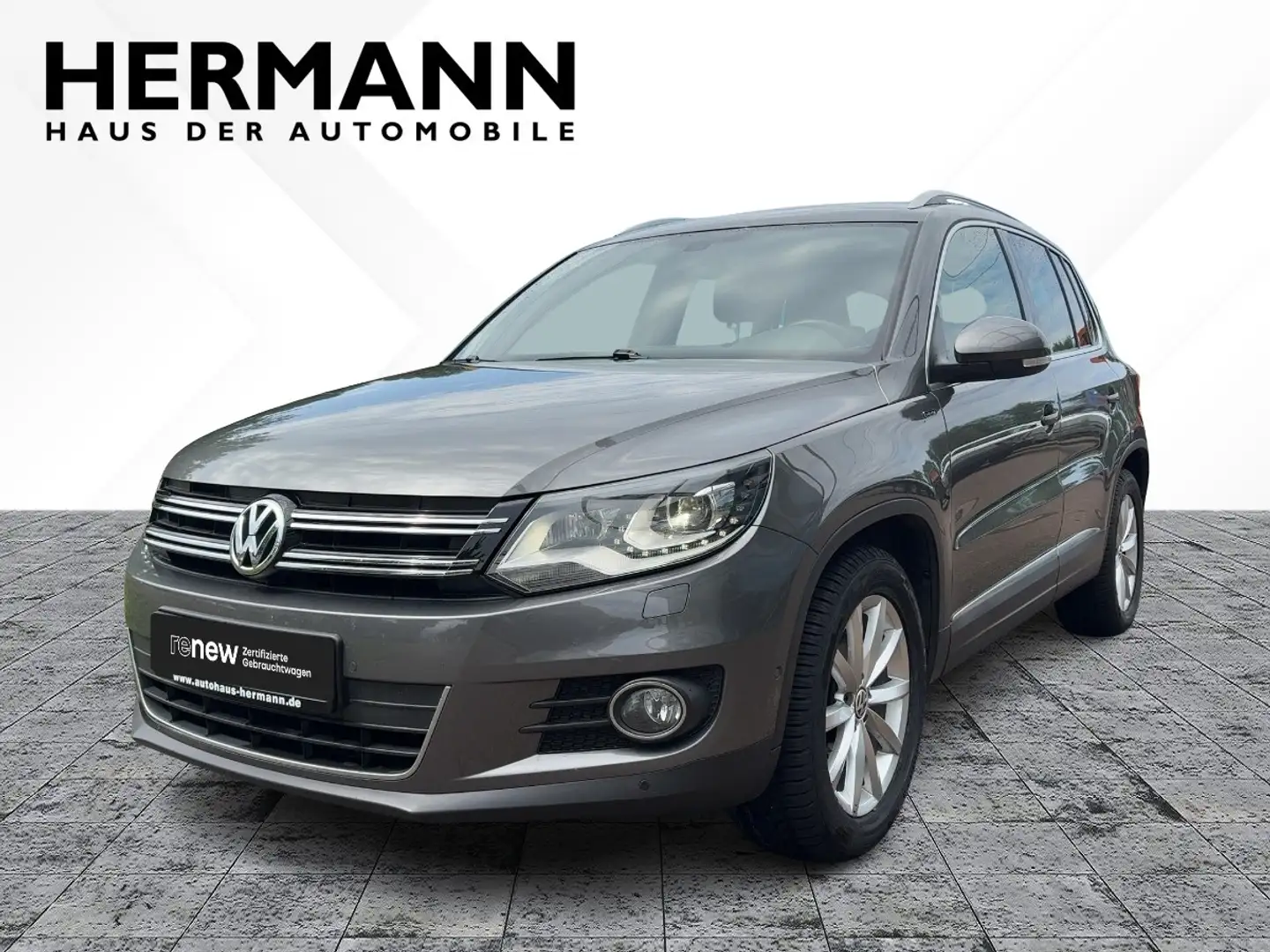 Volkswagen Tiguan 1.4 TSI Lounge *AHK*Navi*Xenon* Grijs - 1