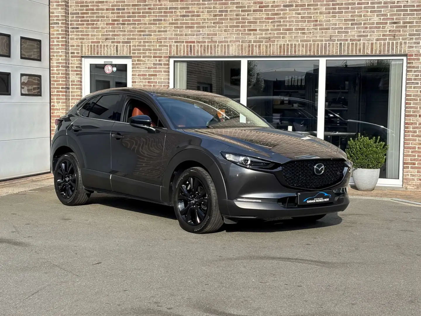 Mazda CX-30 CX-30 2.0 M-HYBRID NAGISA / 27000km / Fabriekswb Gris - 1