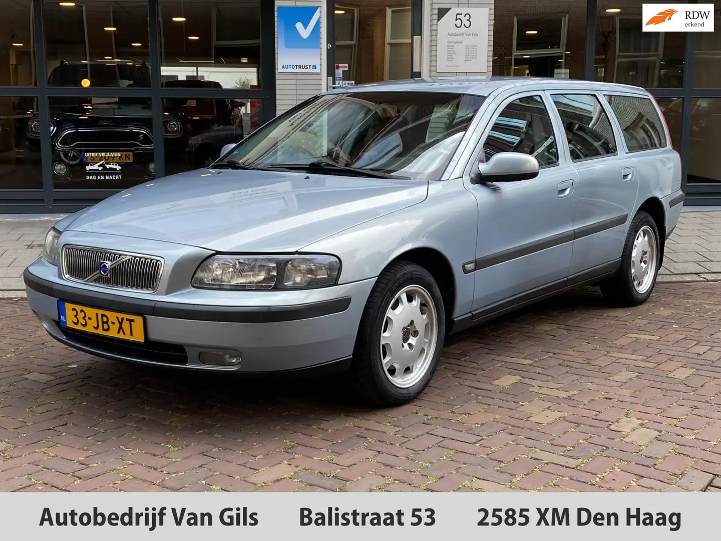 Volvo V70 2.4 T AWD Gtr. C.L. AUTOMAAT | 1/2 LEDER | AIRCO | Grijs - 1
