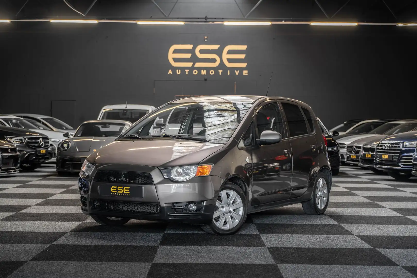 Mitsubishi Colt 1.3 Edition Two | Automaat | Airco Brun - 1