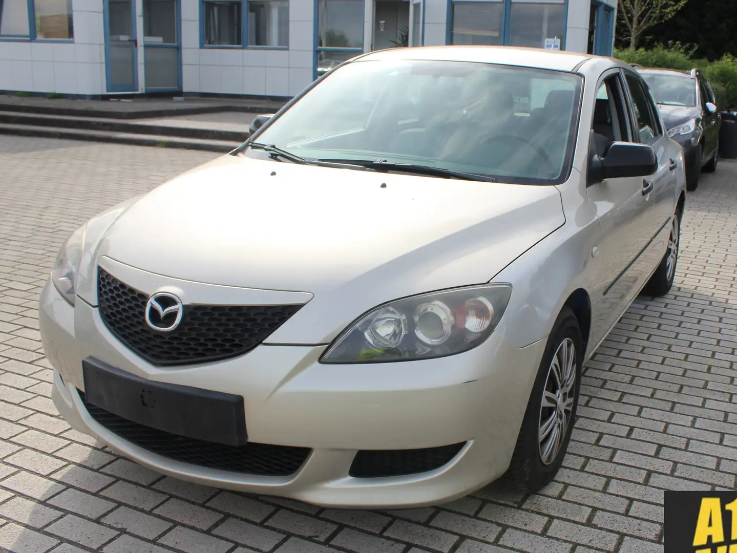 Mazda 3 1.3i | Stadswagen | Radio | 12m garantie | Benzine Grijs - 1