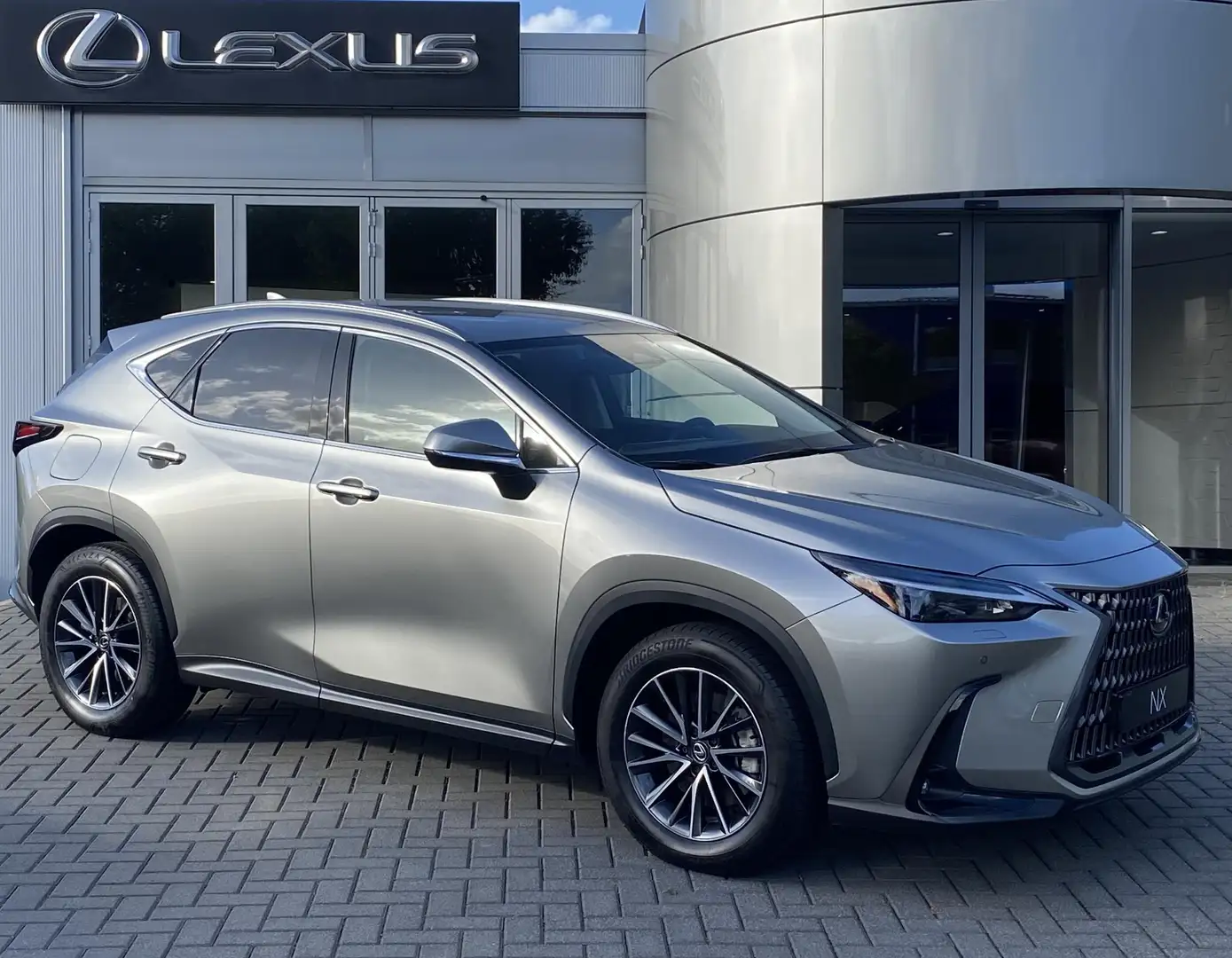 Lexus NX 450h+ AWD Luxury Line STOELVERW STUURVERW LEDER PARKSENS Gris - 1