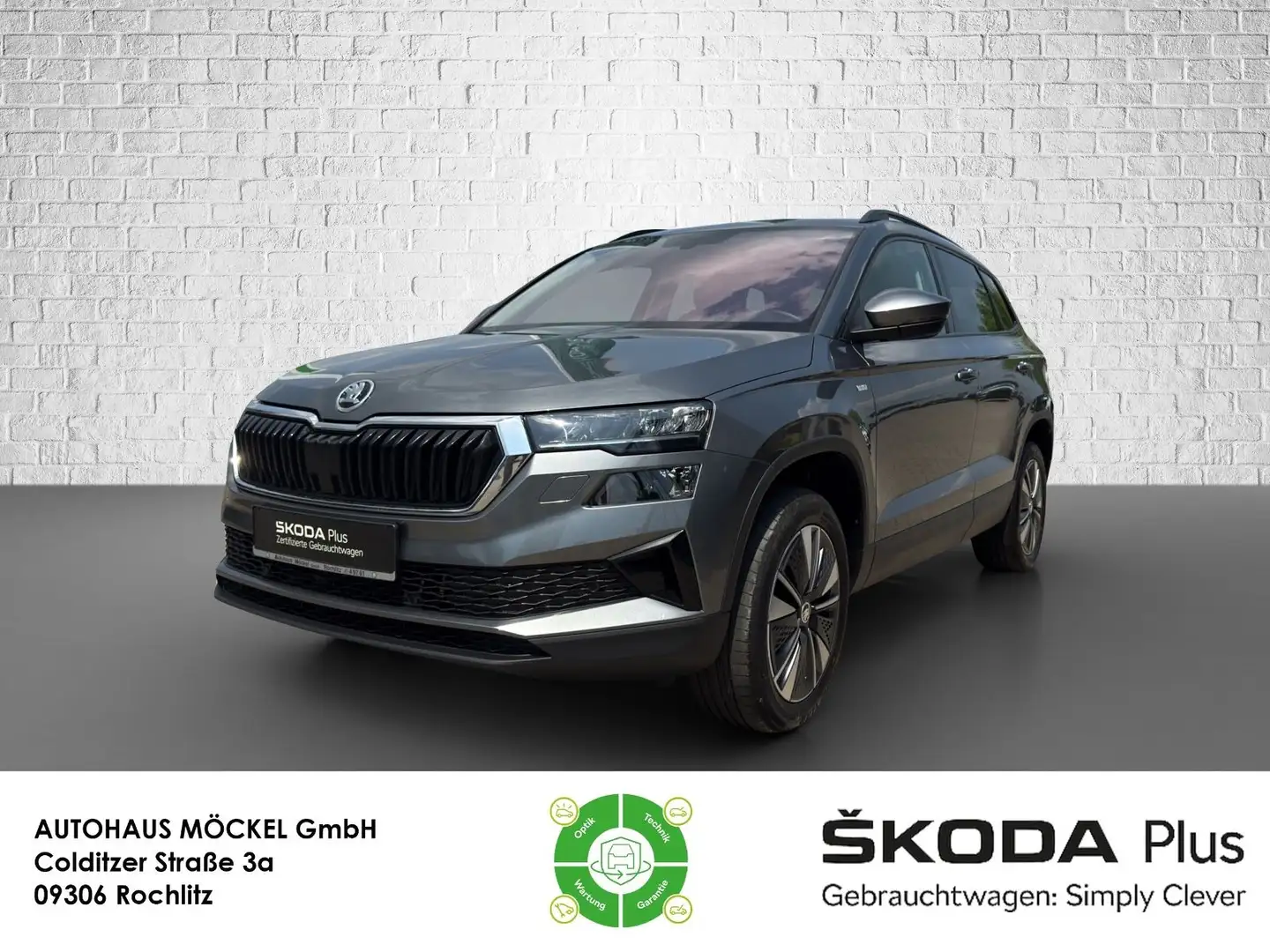 Skoda Karoq Tour 1.5 TSI ACC/PDC/AHK/Navi/Kamera Grijs - 1