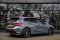 BMW 135 1-serie M135i xDrive High Executive 306pk , Harman Grijs - thumbnail 2