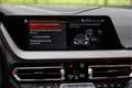 BMW 135 1-serie M135i xDrive High Executive 306pk , Harman Grijs - thumbnail 17