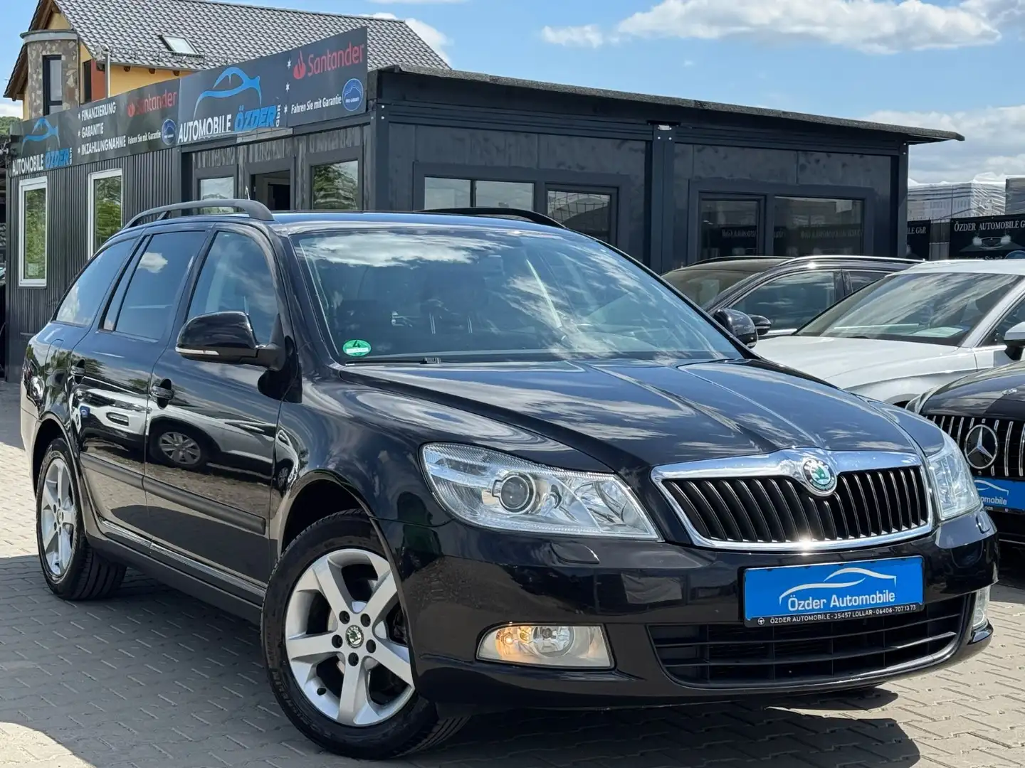 Skoda Octavia 2.0 TDI Combi Family+Finanzierung+ Schwarz - 1