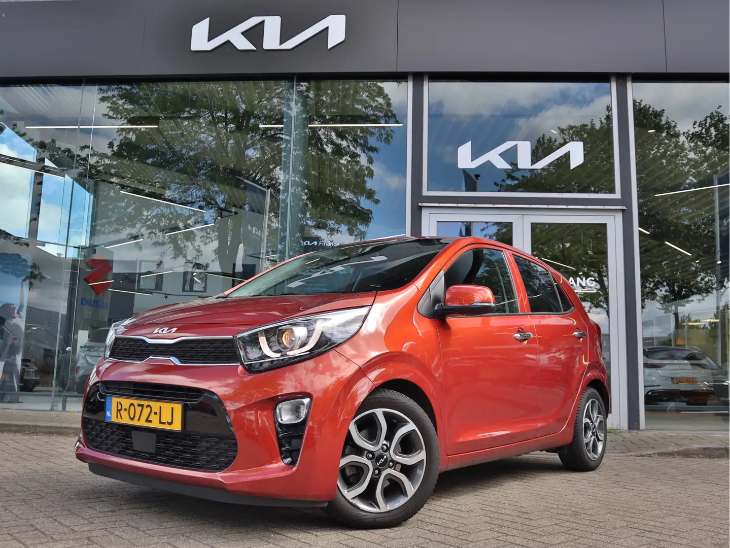 Kia Picanto 1.0 DPi DynamicPlusLine 5p | Climate Control | Cr. Oranje - 1