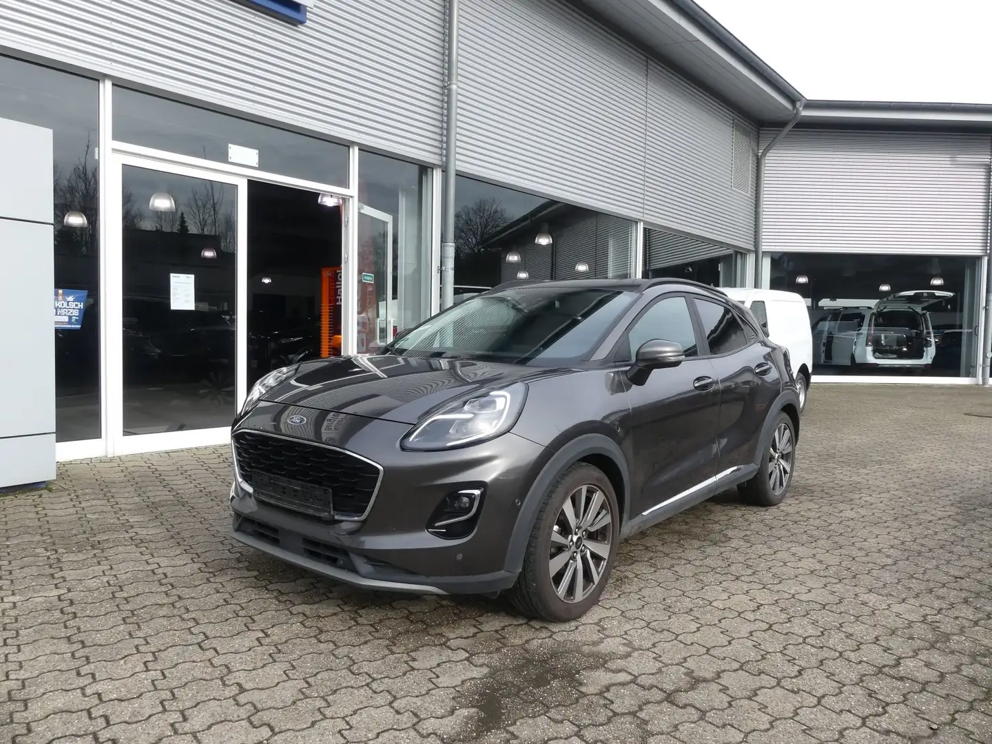 Ford Puma TITANIUM X 1.0T MHEV 155P Grijs - 1