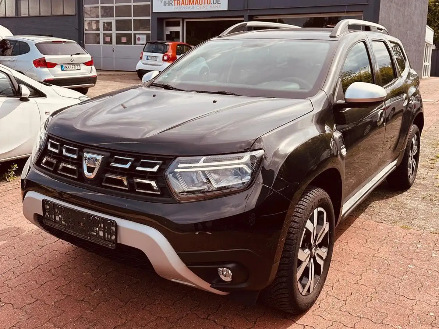 Dacia Duster PRESTIGE+AUTOMATIK+1. HAND+SITZHEIZ+PDC+AHK+NAVI Noir - 1