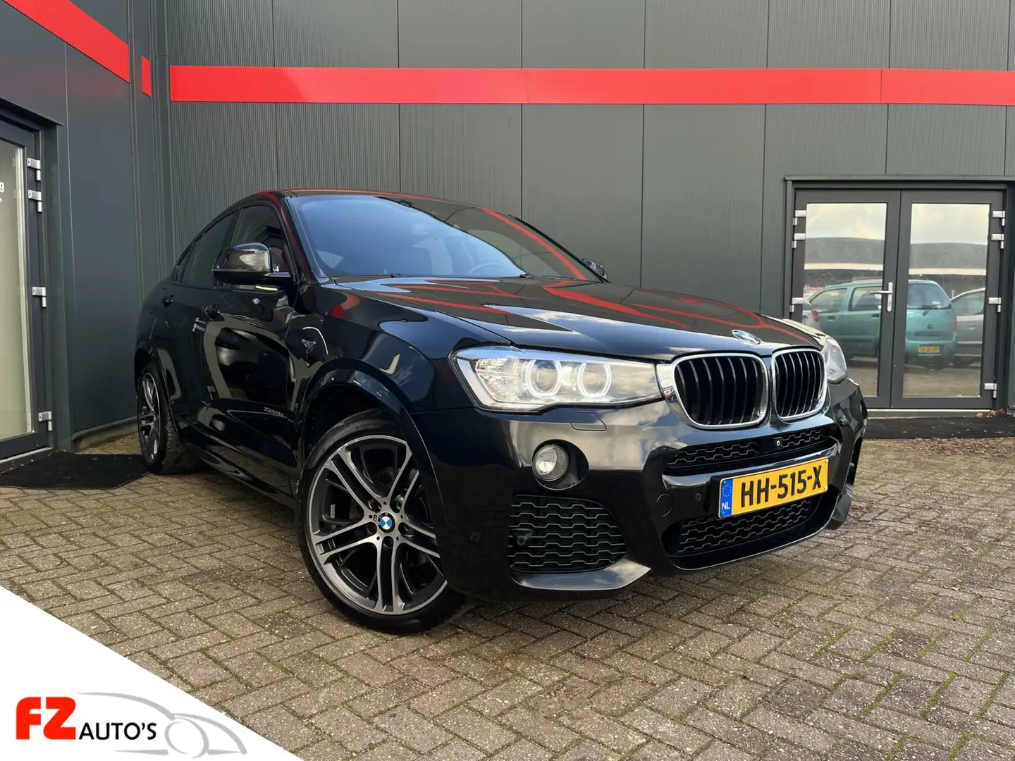 BMW X4 xDrive20d High Executive | L.M Velgen | M Pakket | Zwart - 1