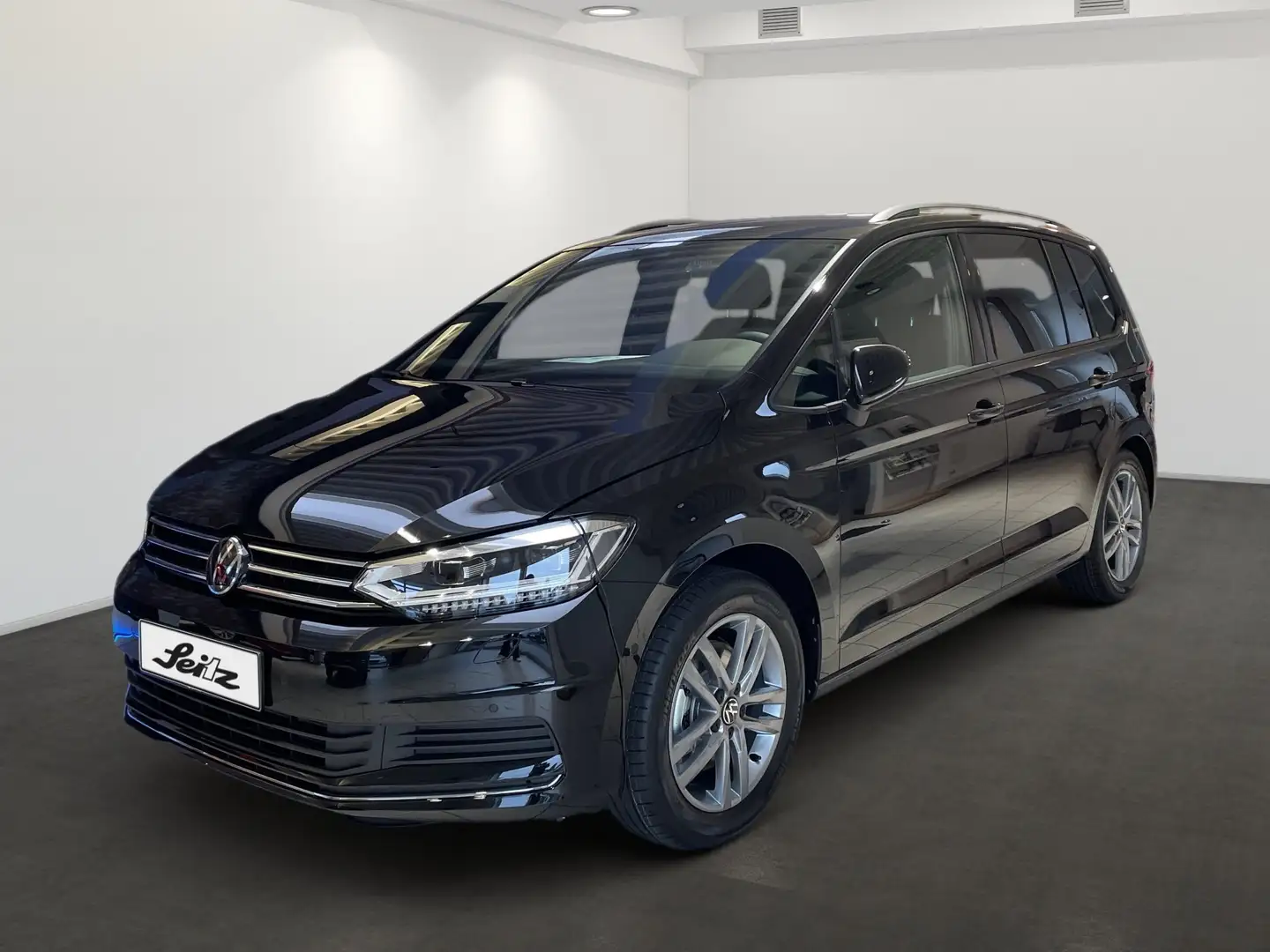 Volkswagen Touran 1.5 TSI Energy *7-SITZER*NAVI*KAMERA* Zwart - 2