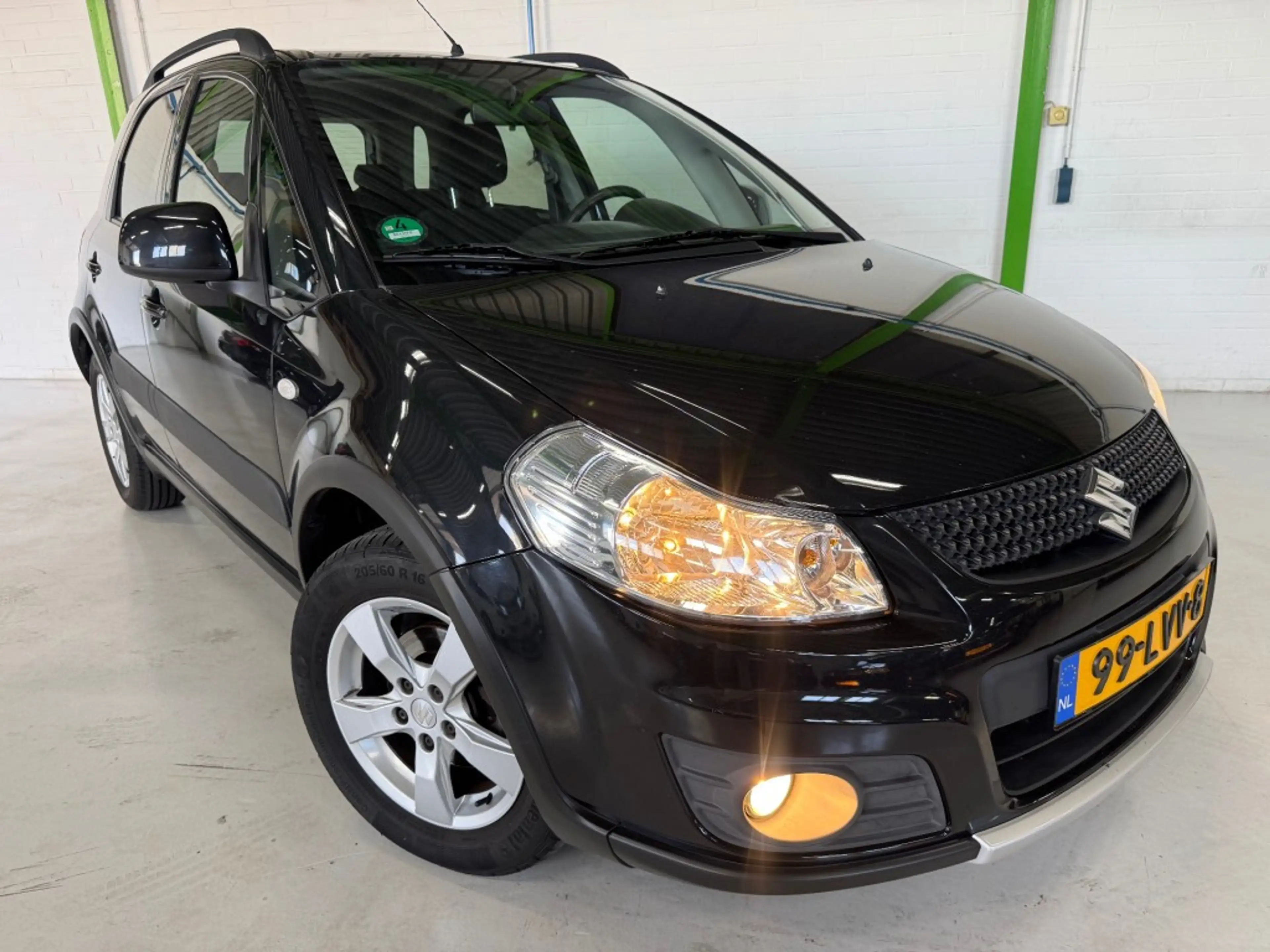 Suzuki SX4 1.6 EXCLUSIVE / Trekhaak / 95352 km / Stoelverwarm — photo 10