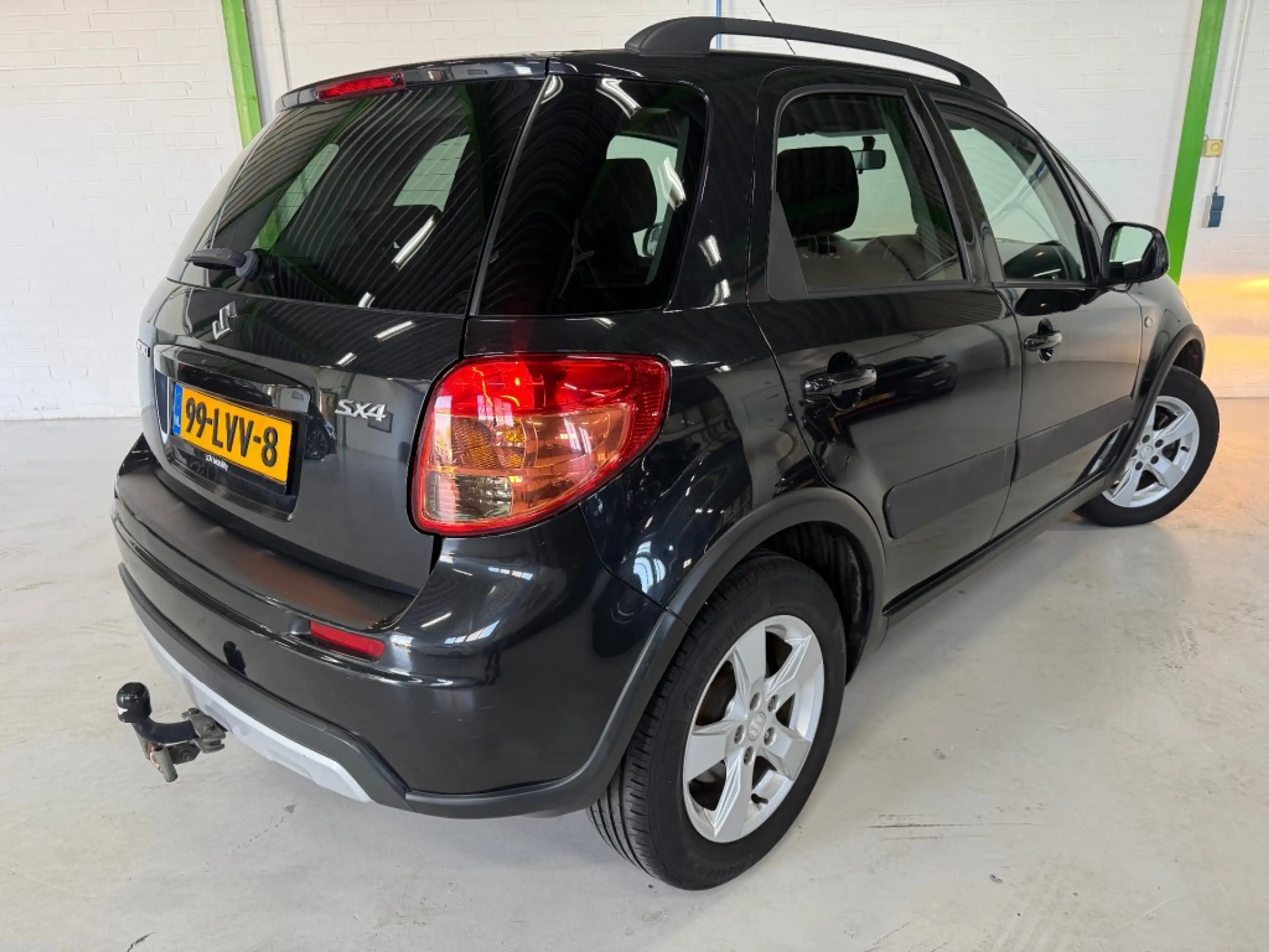 Suzuki SX4 1.6 EXCLUSIVE / Trekhaak / 95352 km / Stoelverwarm — photo 6