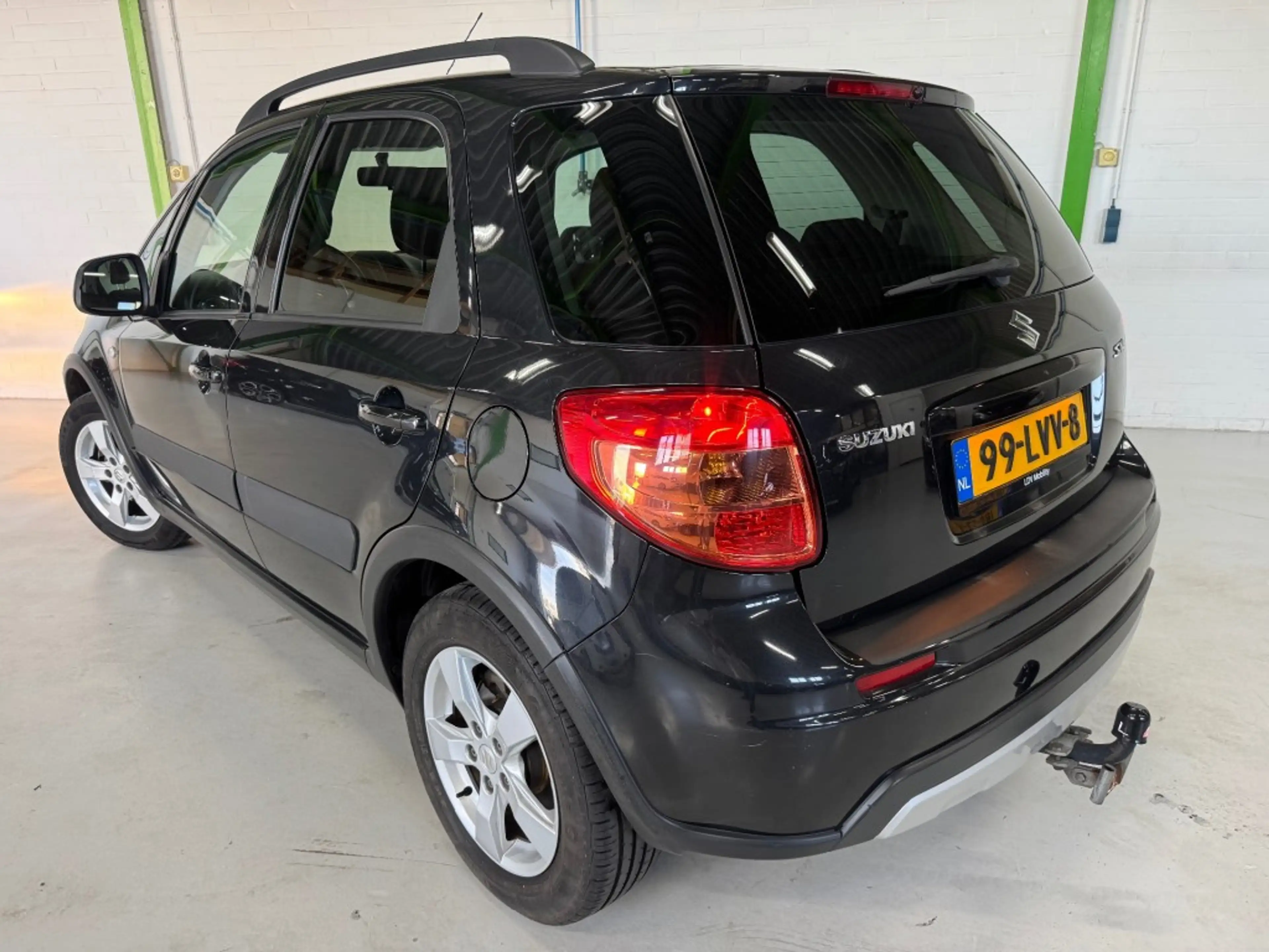 Suzuki SX4 1.6 EXCLUSIVE / Trekhaak / 95352 km / Stoelverwarm — photo 4