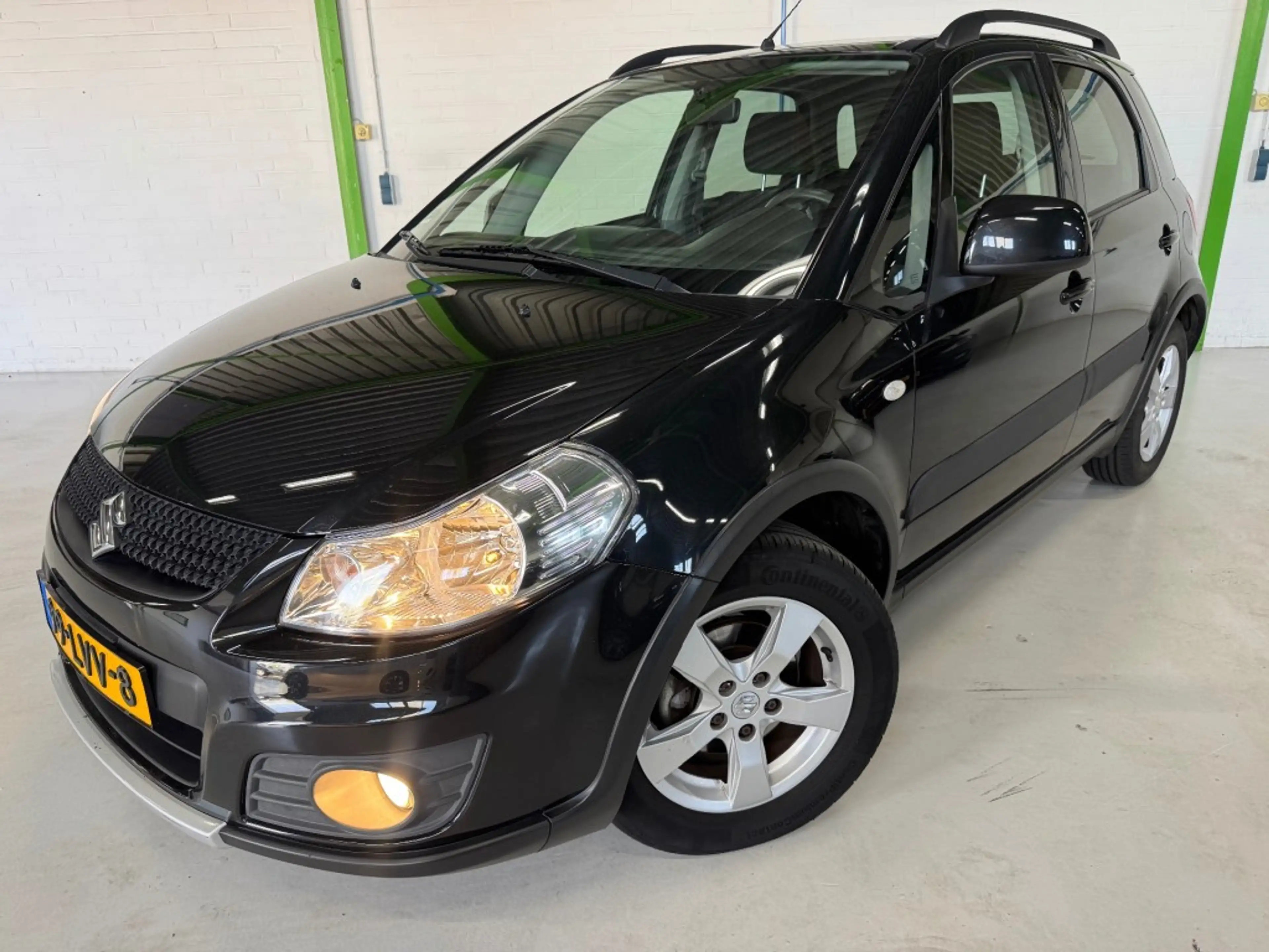 Suzuki SX4 1.6 EXCLUSIVE / Trekhaak / 95352 km / Stoelverwarm — photo 2