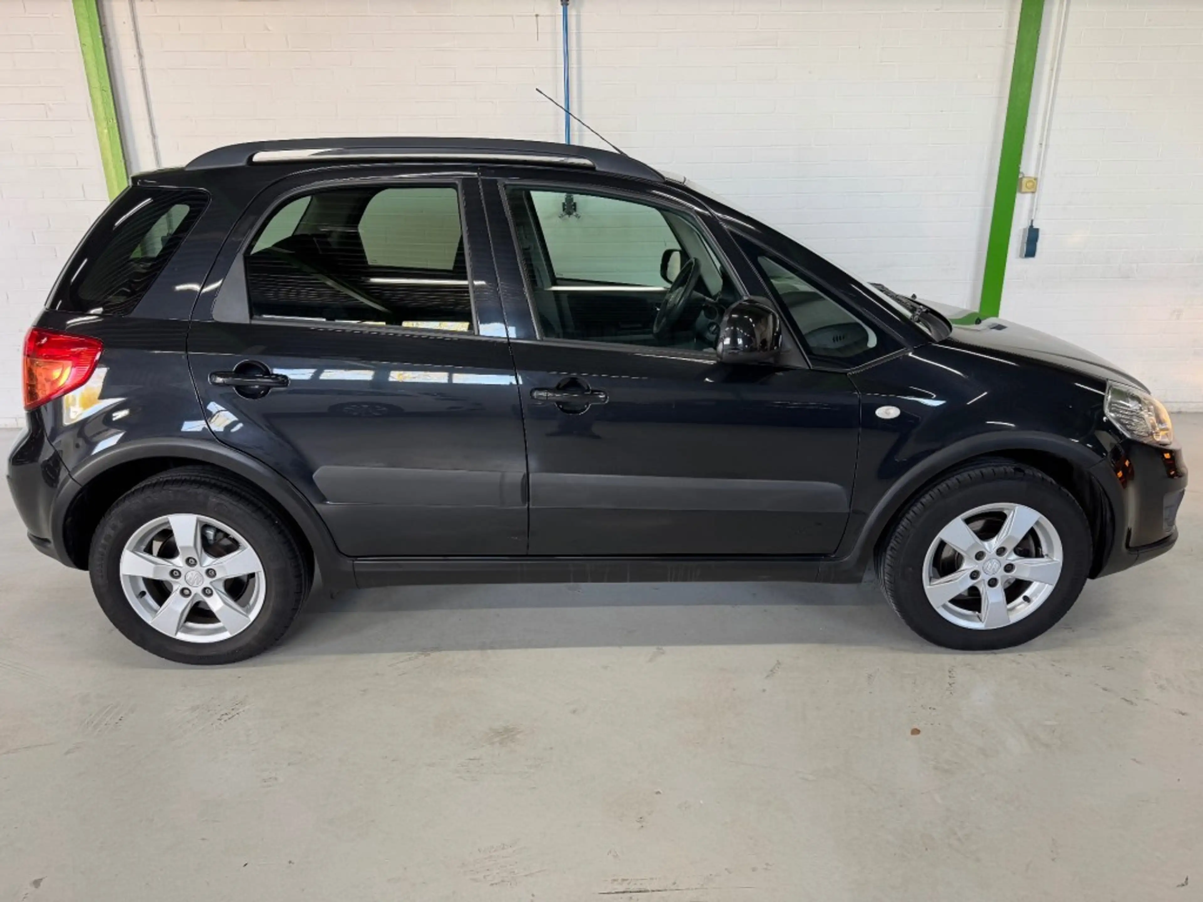 Suzuki SX4 1.6 EXCLUSIVE / Trekhaak / 95352 km / Stoelverwarm — photo 9