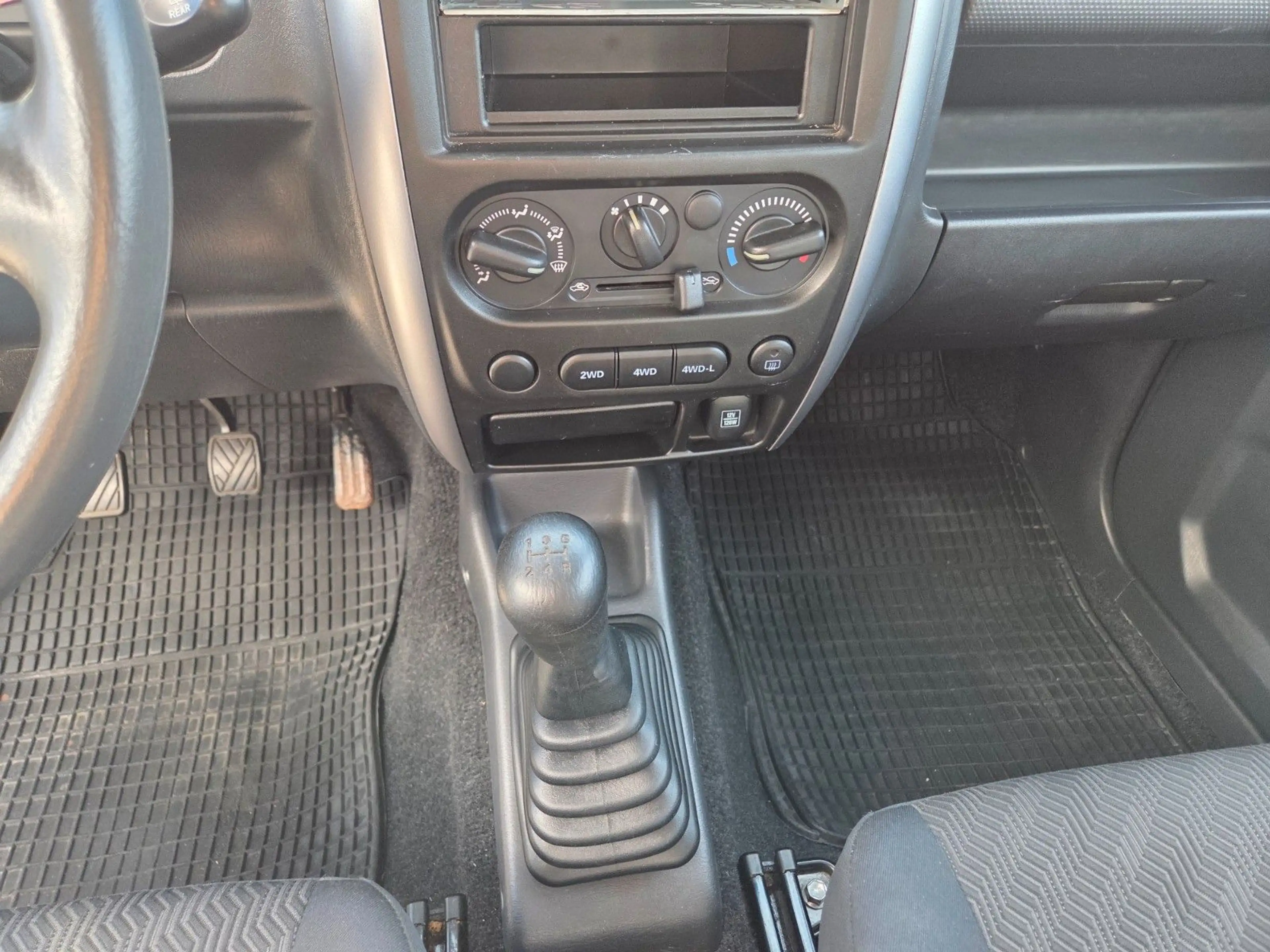 Suzuki Jimny 1.3 4WD, AHK — photo 16
