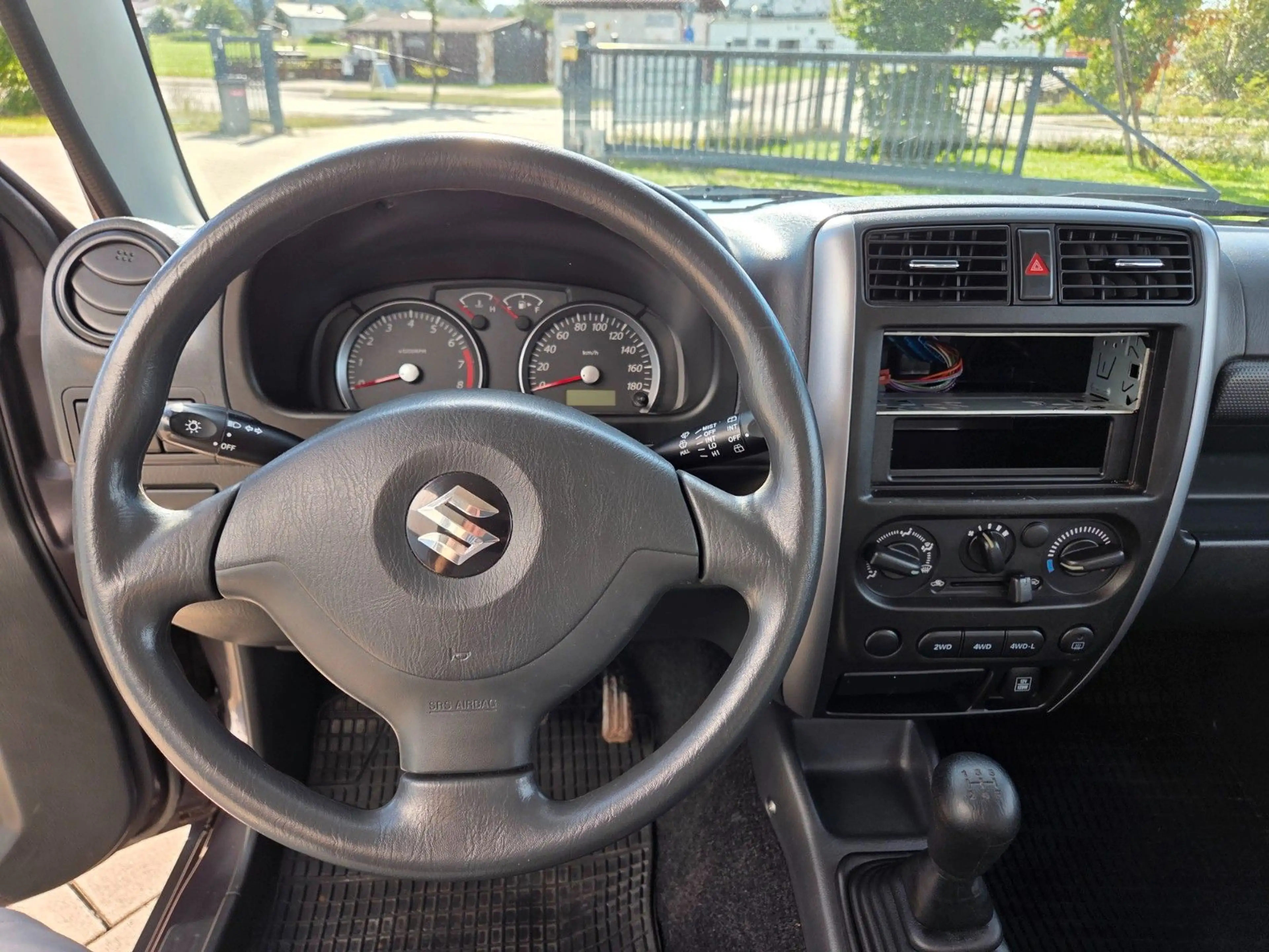 Suzuki Jimny 1.3 4WD, AHK — photo 15