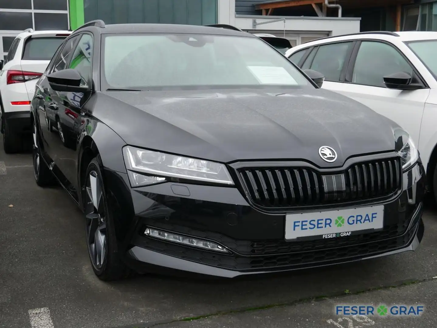 Skoda Superb Combi 2.0 TDI Sportline 4x4 AHK/ACC/NAVI Schwarz - 2