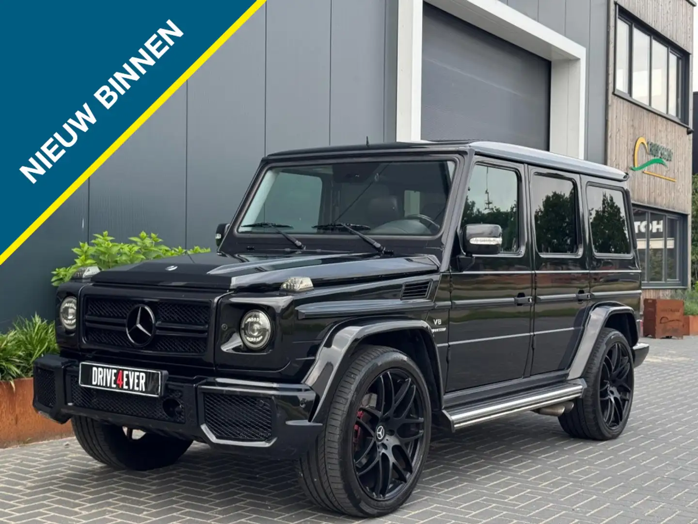 Mercedes-Benz G 55 AMG K. St.Wagon 477pk FULL YOUNGTIMER SCHUIFDAK NAVI T Zwart - 1