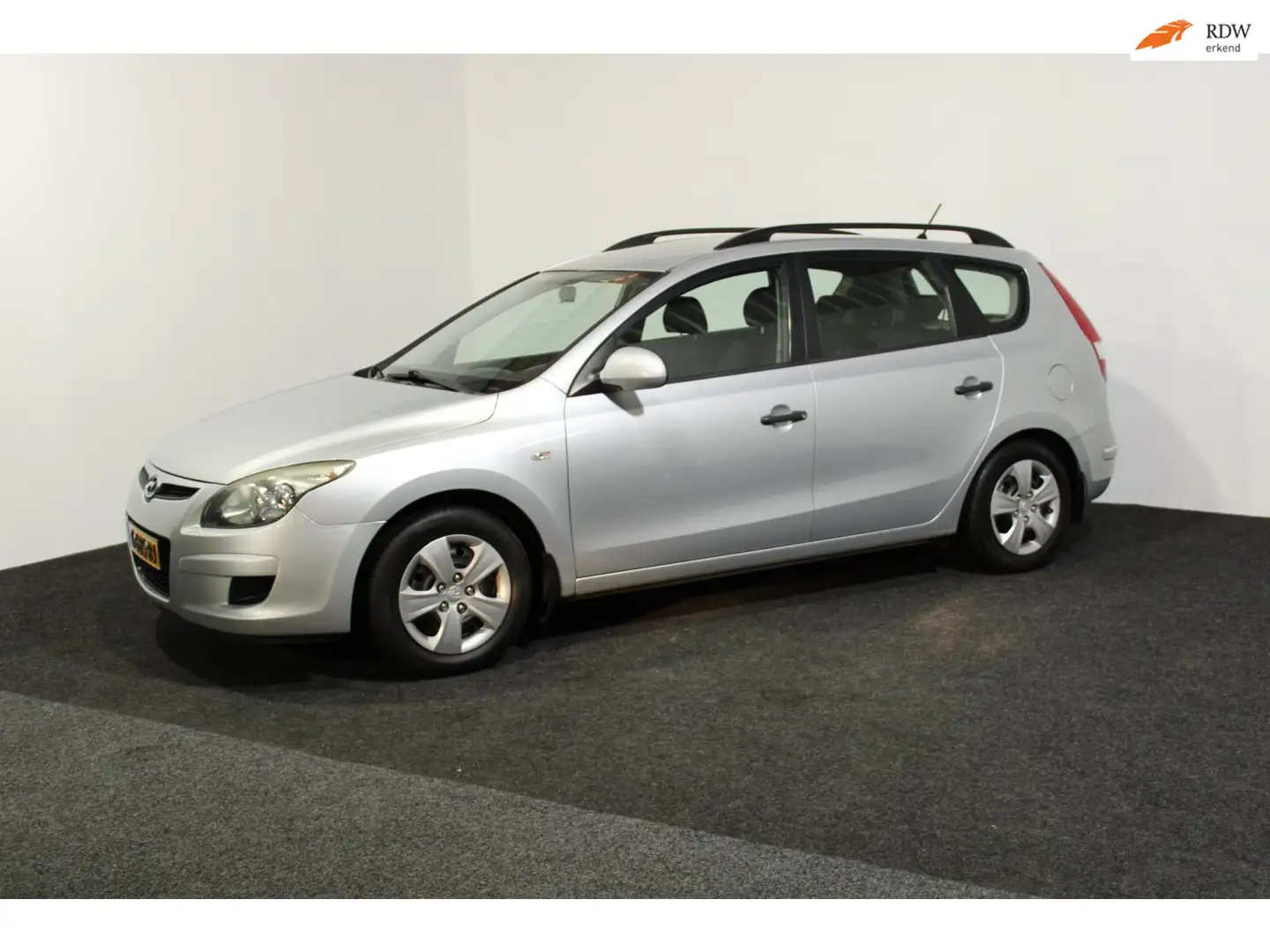 Hyundai i30 CW 1.4i Blue Active|Stationwagon|2010|Nieuwe APK e Grijs - 1