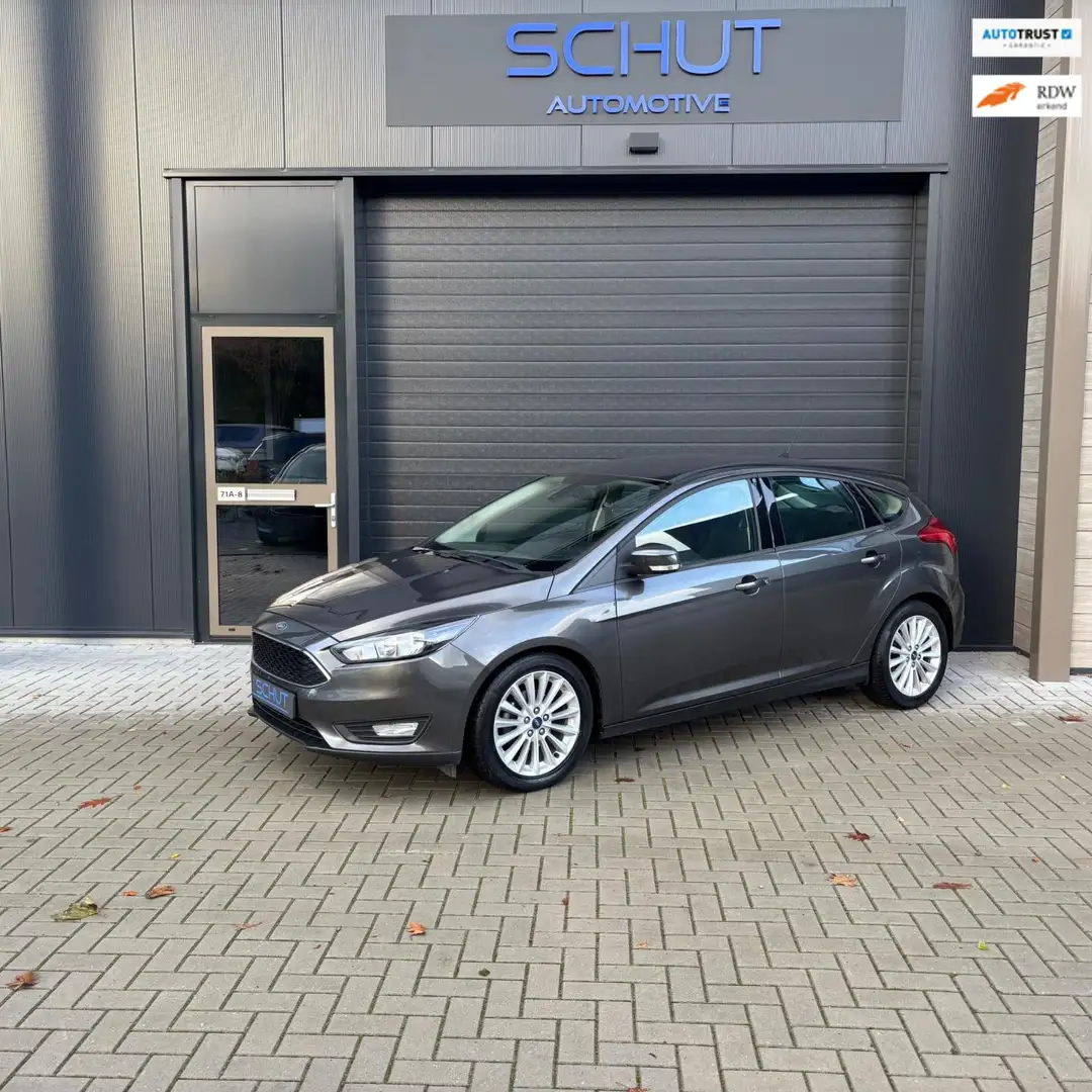 Ford Focus 125pk Edition CLIMA | LED | CRUISE CONTROL | STUUR Grijs - 1