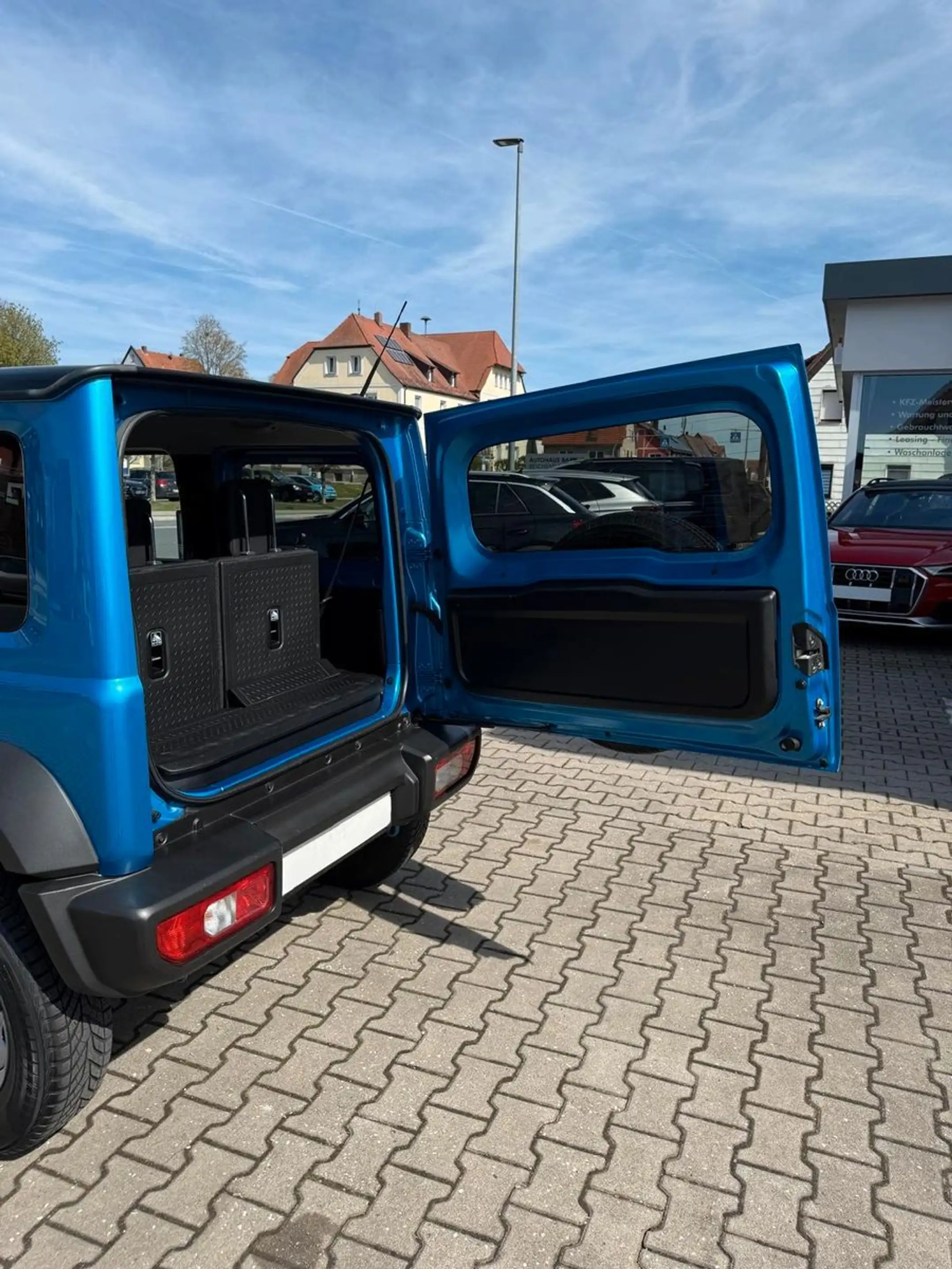 Suzuki Jimny Comfort AllGrip NAVI SHZ 5-GANG SCHECKHEFT — photo 10