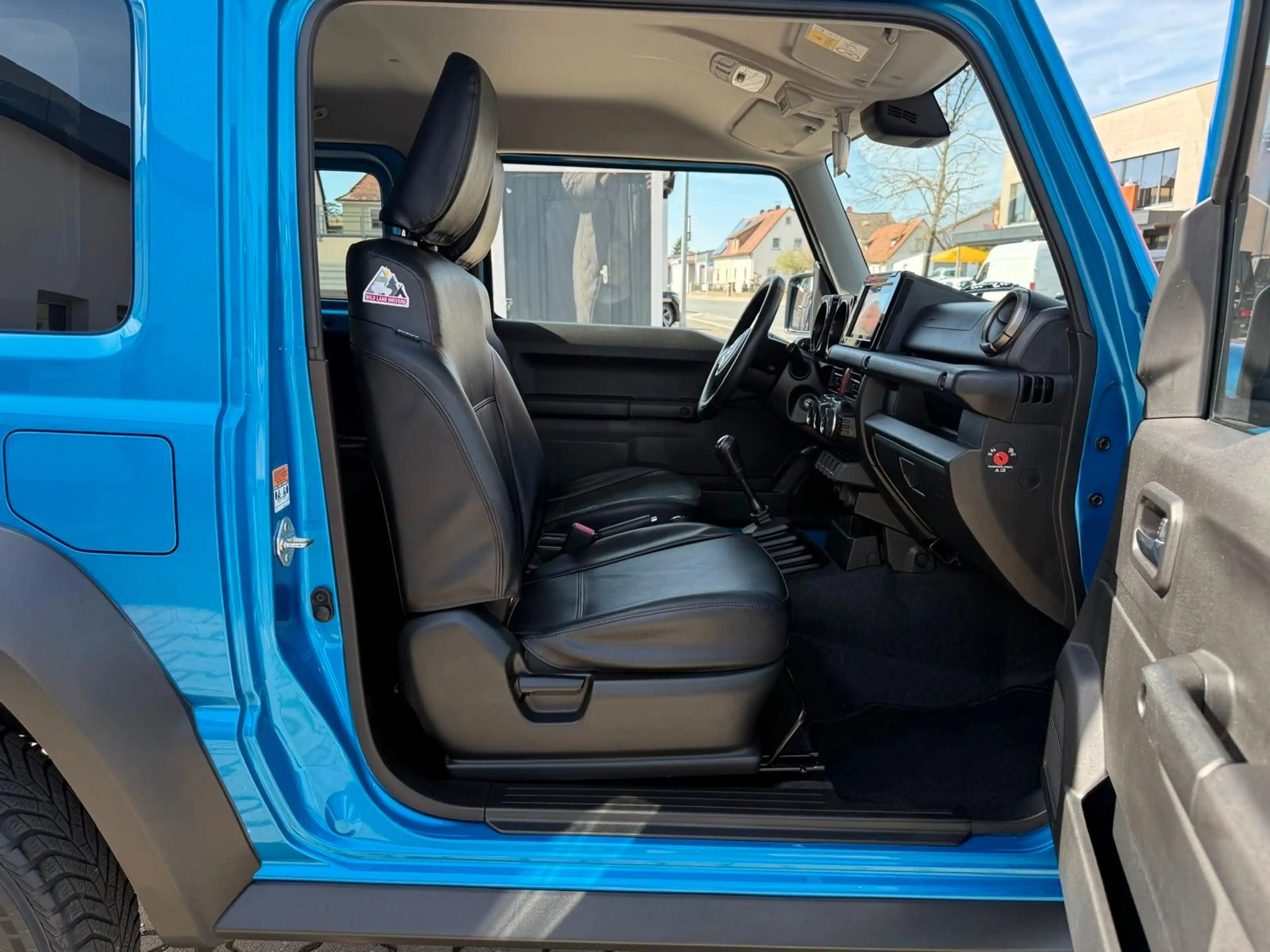 Suzuki Jimny Comfort AllGrip NAVI SHZ 5-GANG SCHECKHEFT — photo 12