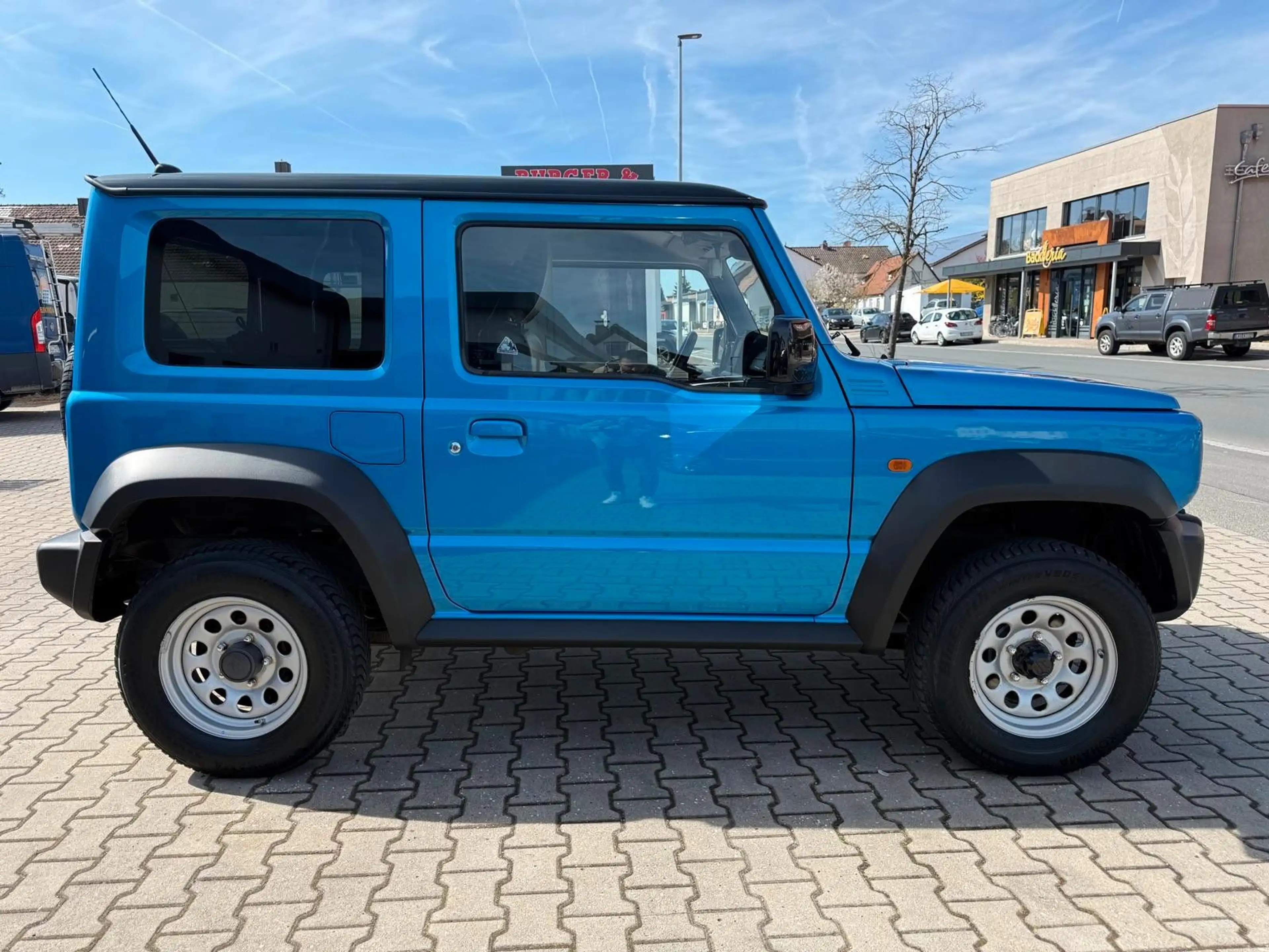 Suzuki Jimny Comfort AllGrip NAVI SHZ 5-GANG SCHECKHEFT — photo 4