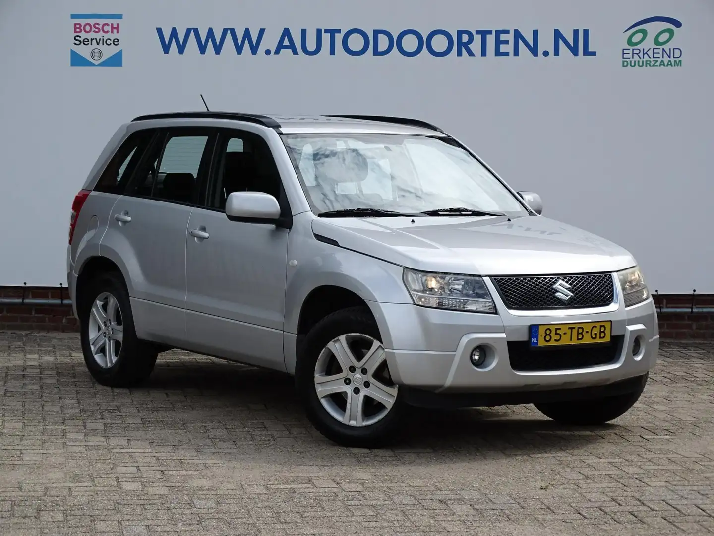 Suzuki Grand Vitara 2.0-16V Exclusive 4X4|Trekhaak|Keyless|Top onderho Szürke - 1