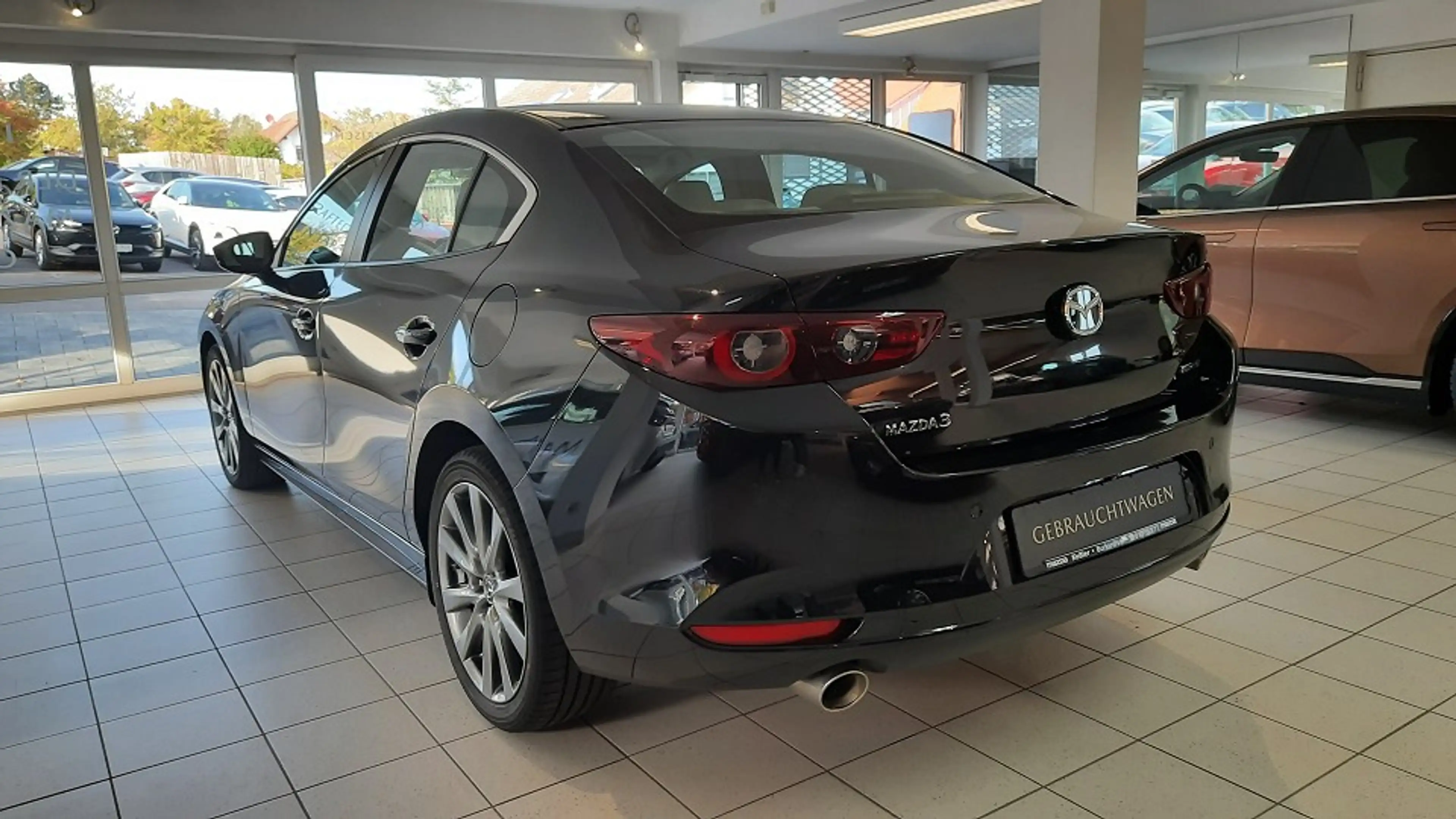 Mazda 3 SKYACTIV-X 2.0 M Hybrid Selection *Premium*Leder*N — photo 4