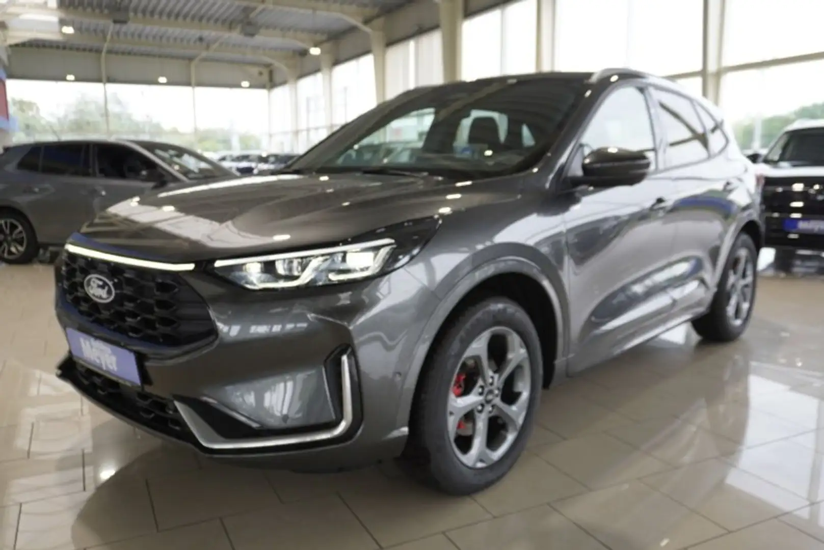 Ford Kuga ST-Line X 2,5 FHEV AWD Pano/AHK/Matrix/el.Klappe Grau - 1