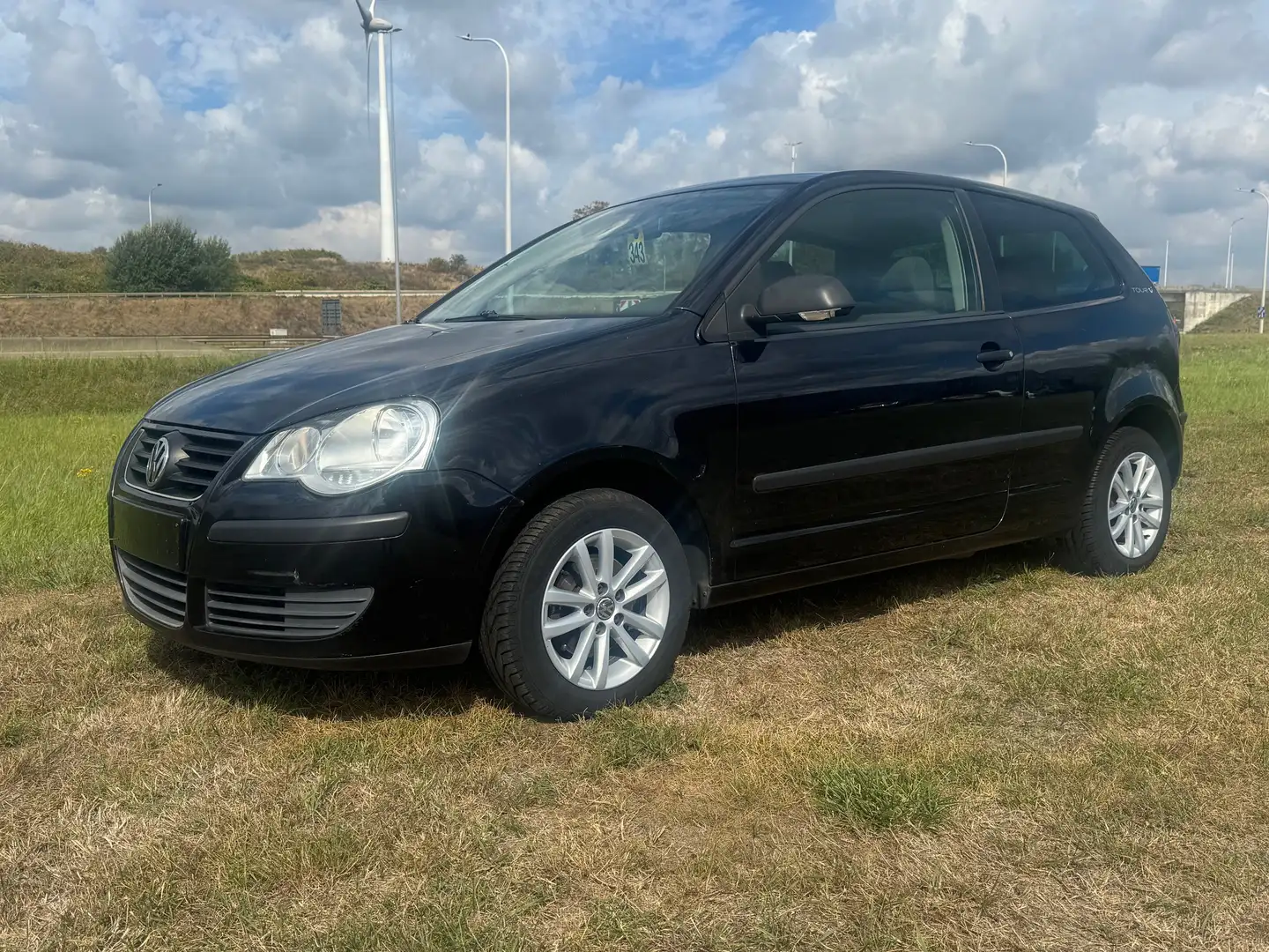 Volkswagen Polo 1.2i Tour / garantie 12m. Zwart - 1